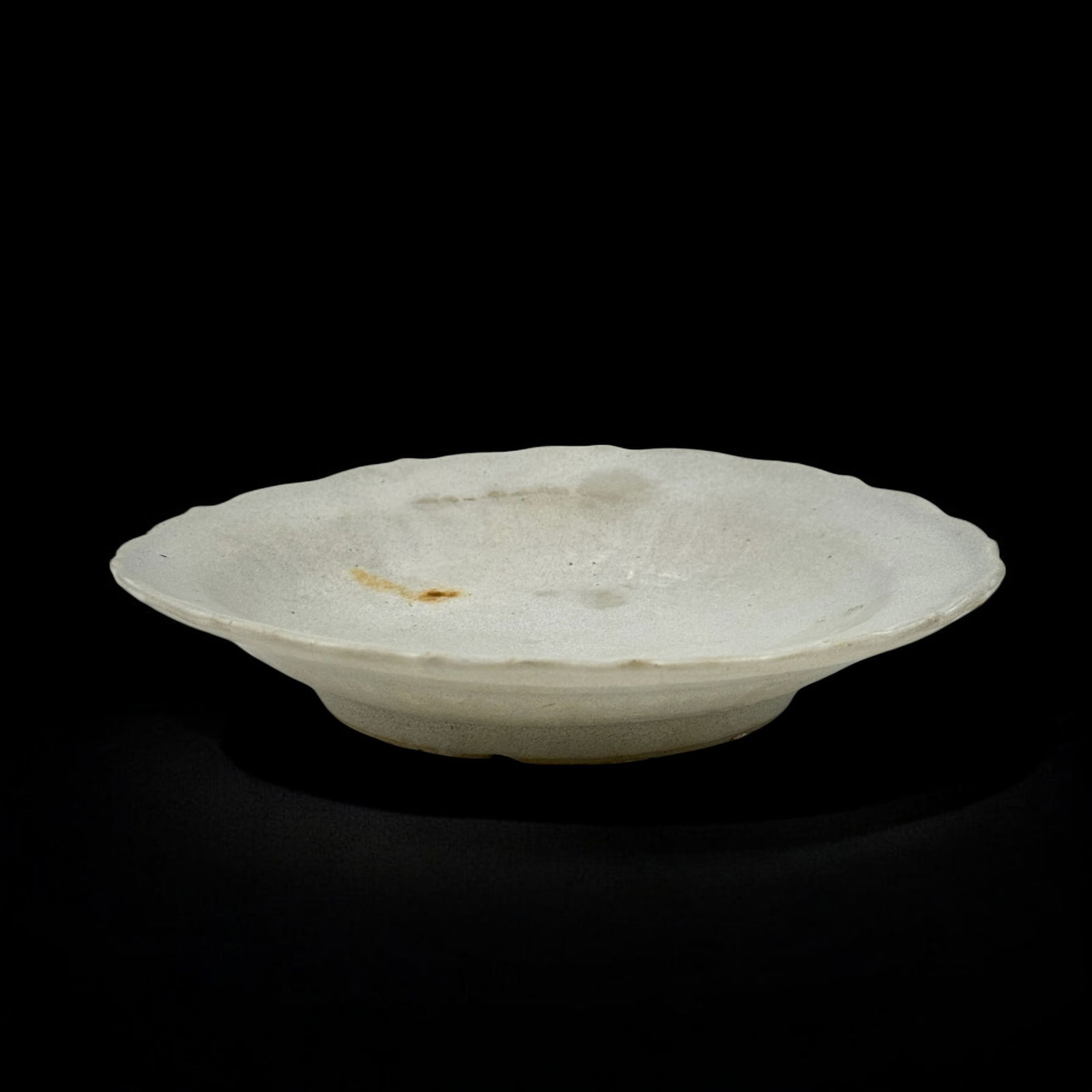 Chinese Pale White Celadon Lotus Dish: In heavy celadon glaze, 19th century or earlier. A lotus form dish with loed form to body. Diameter 6". Provenance: David Johnson, Taft Museum curator via Lally, NYC.