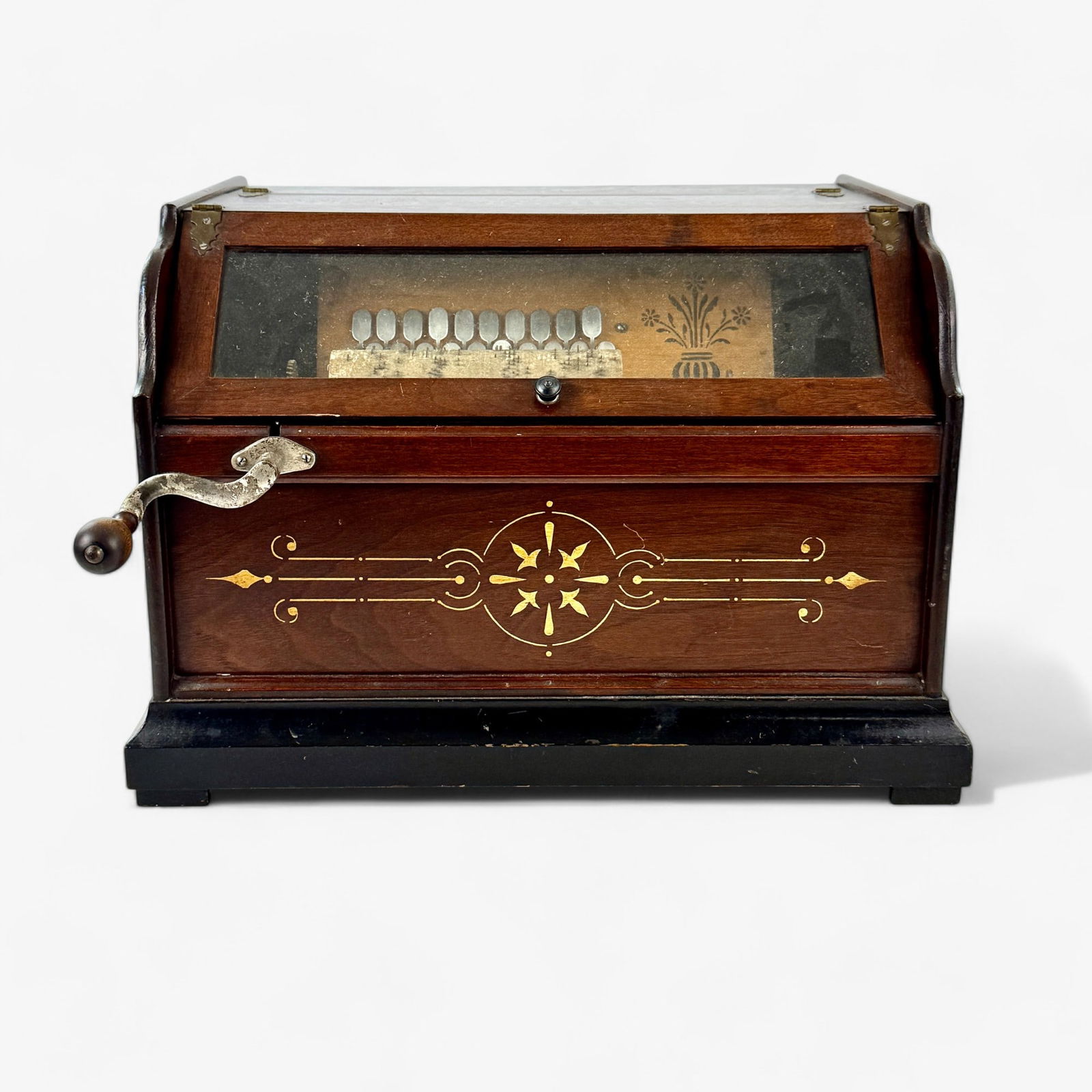 1890's Concert Roller Organ: Possibly made by the Autophone company in Ithaca, NY. It is a 20 note model with 20 reeds and a glass front cover. This organ plays a metal pin studded wooden cylinder called a "cob". Accompanied by n