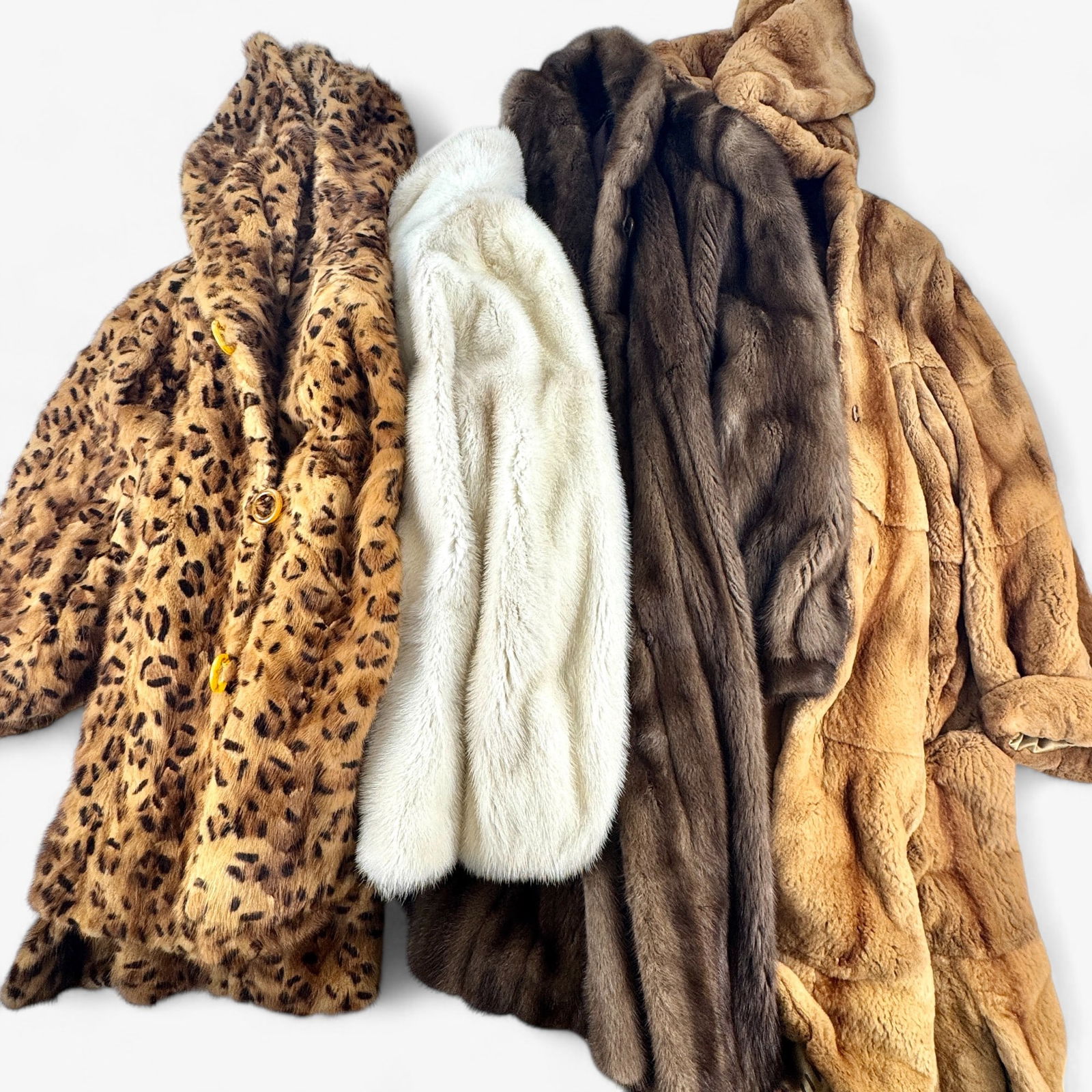 Group of Four Fine Furs: Including one example by Zandra Rhodes, one by Revillon, one Leopard fur by Birger Christensen and one unlabeled. All nice examples.
