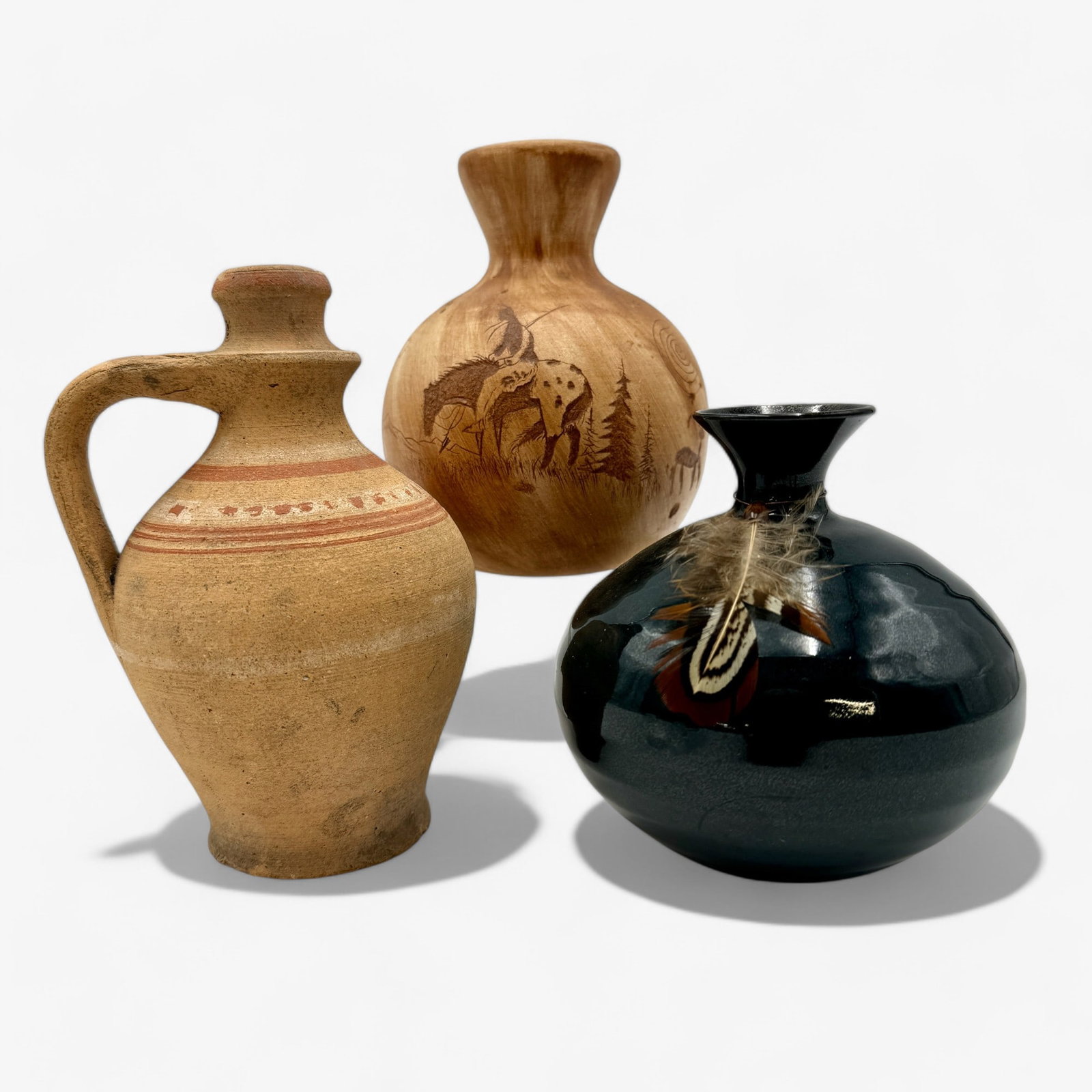 Trio of Pottery: Including one Navajo example, signed, one Hungarian example and one standard glaze signed American Indian pot. Tallest height: 6.25"