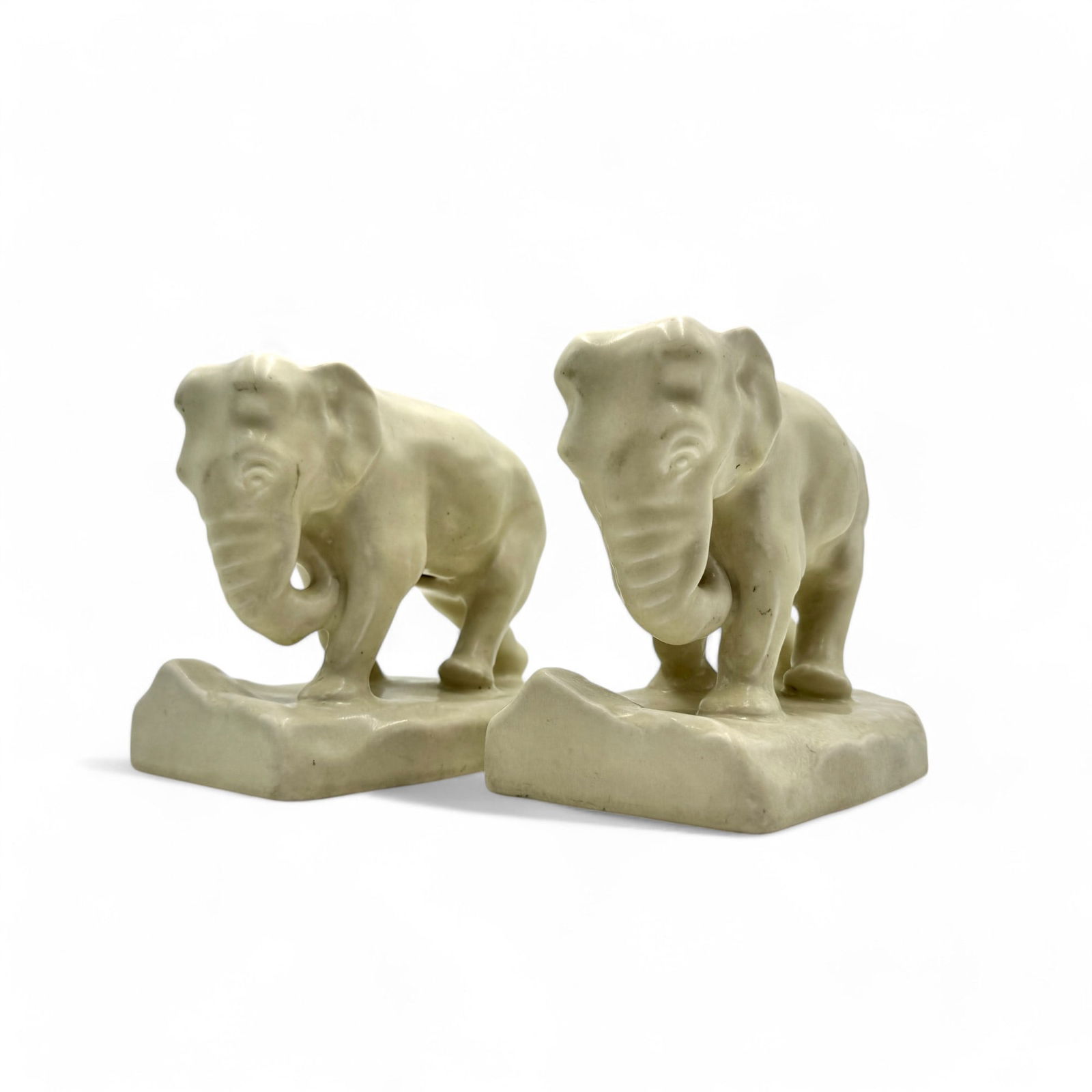 Rookwood Pottery: Trunk Down Elephant Bookends: Rookwood elephant bookends. Shape 2444D. 1921. Impressed factory marks. 5" ht. each. Mint