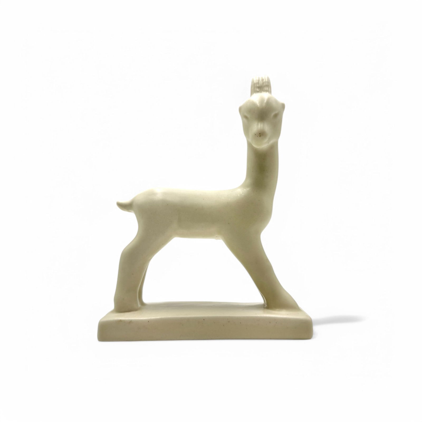 Rookwood Pottery: Gazelle Paperweight: Mat white glaze. Shape 6170. 1945. Impressed marks. 5.75" ht. Mint.