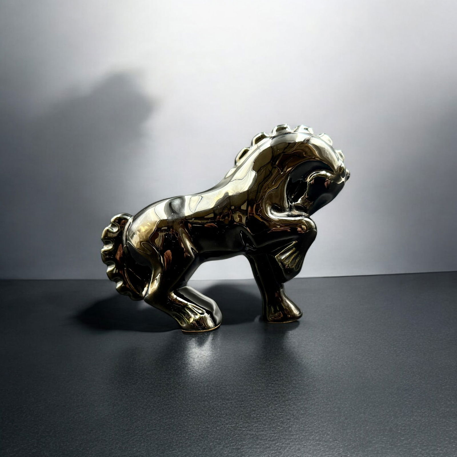 Frankoma Potterry: Circus Horse: Frankoma circus horse, Ada clay. Gunmetal glaze. 6" lg.