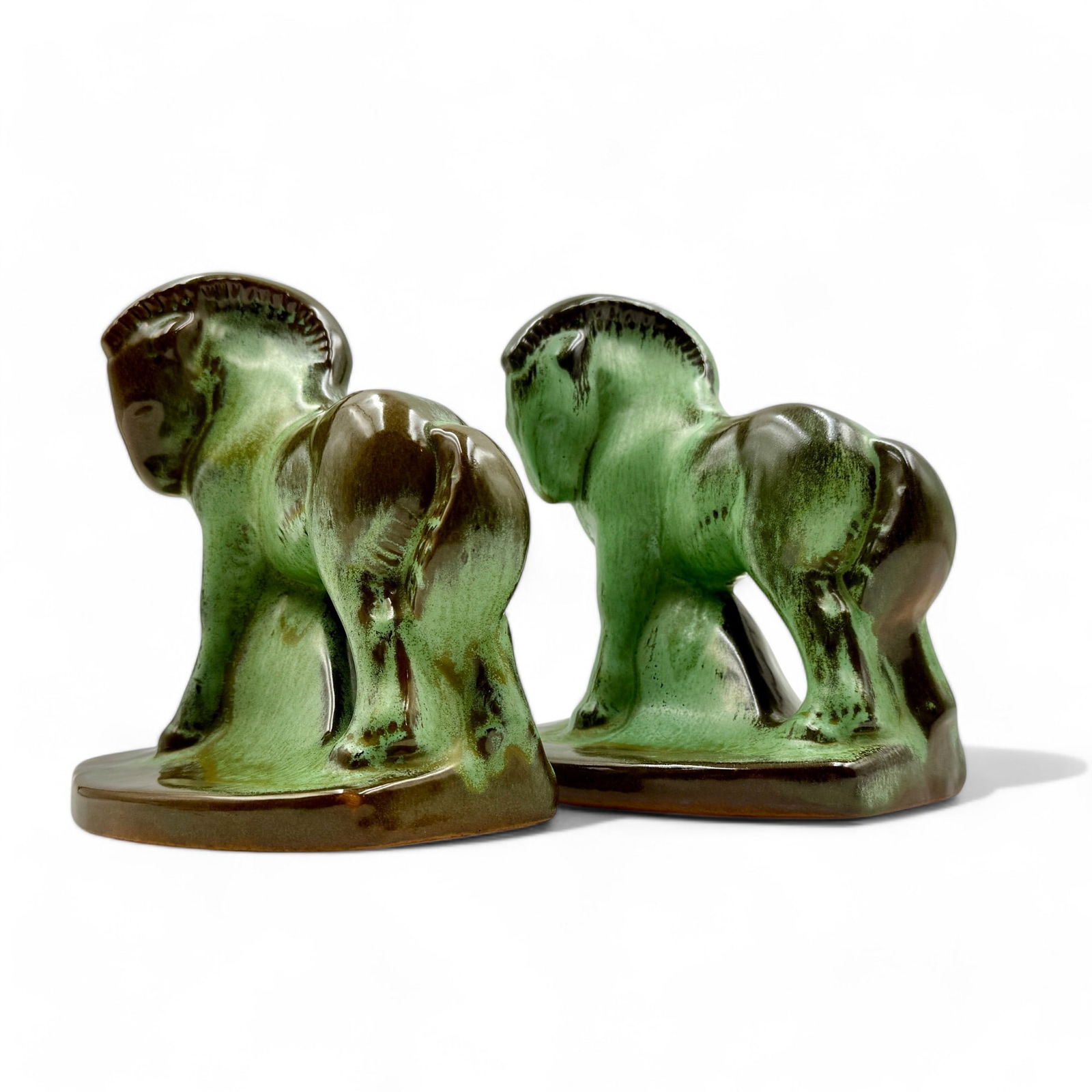 Frankoma Charger Horse Bookends: Frankoma Charger Horse bookends in ada clay with Prairie Green glaze. Each 6.25" ht.