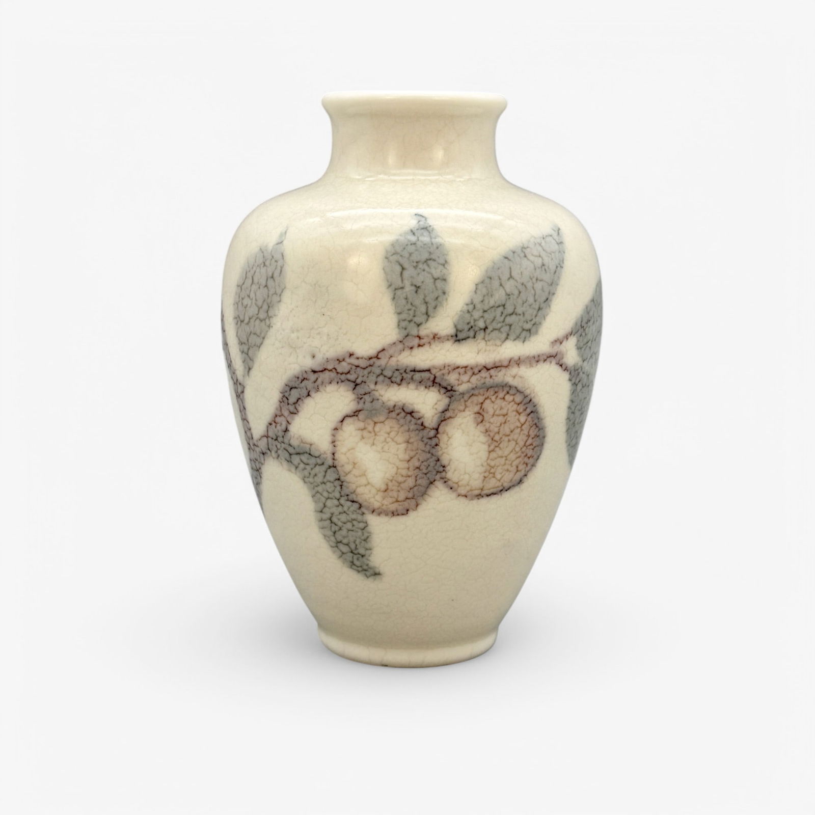 Jens Jensen for Rookwood Pottery: 1944, shape number 6880. Impressed Rookwood stamp and artist's cipher to base. Wax mat or "butterfat" glaze with cherry tree decoration in the round. Height: 7"