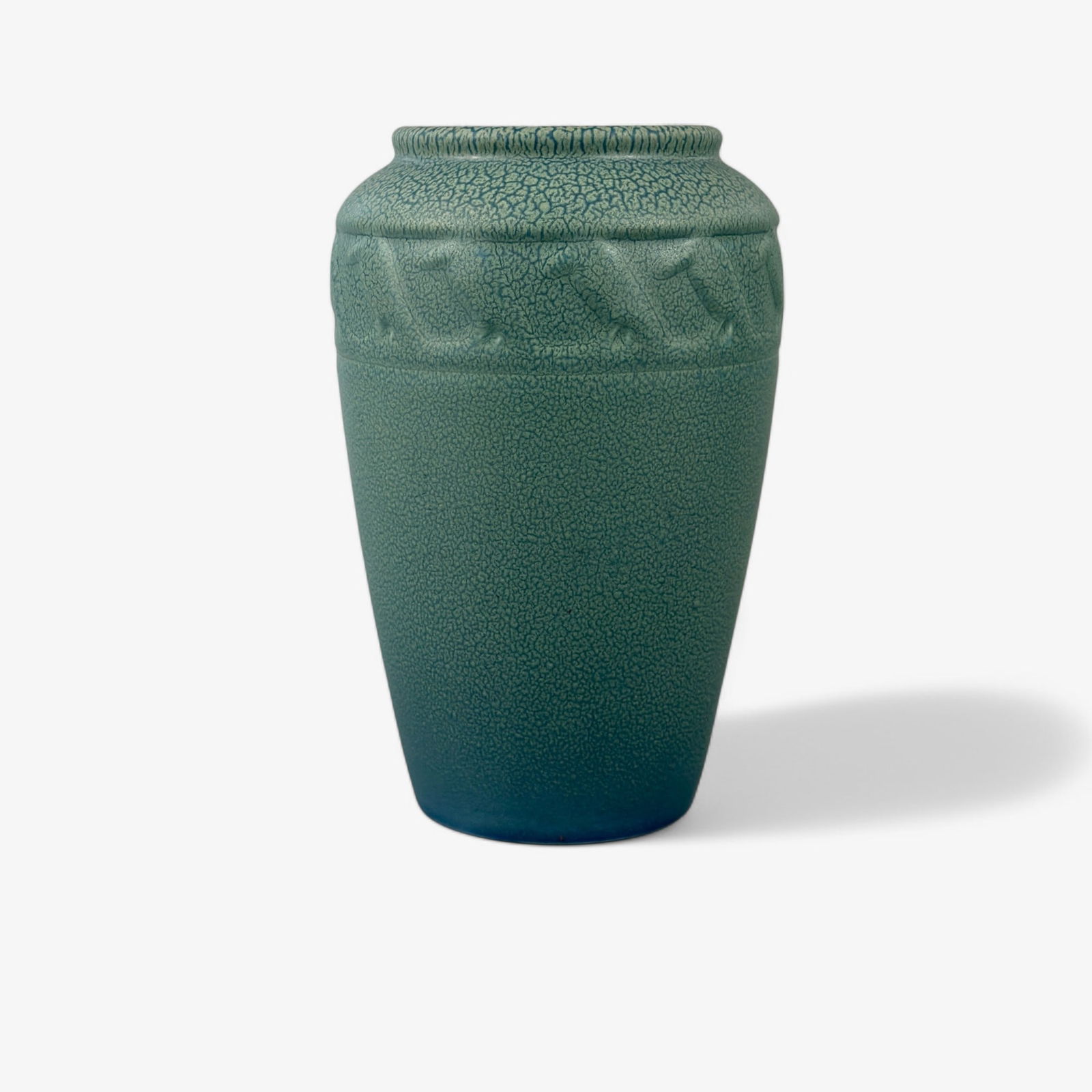 Rookwood Production Vase with Rooks: Rookwood Pottery, CIncinnati. 1922, shape number 2314, with a mottled green glaze. Marked to underside and with old sale tag. Ht. 7".