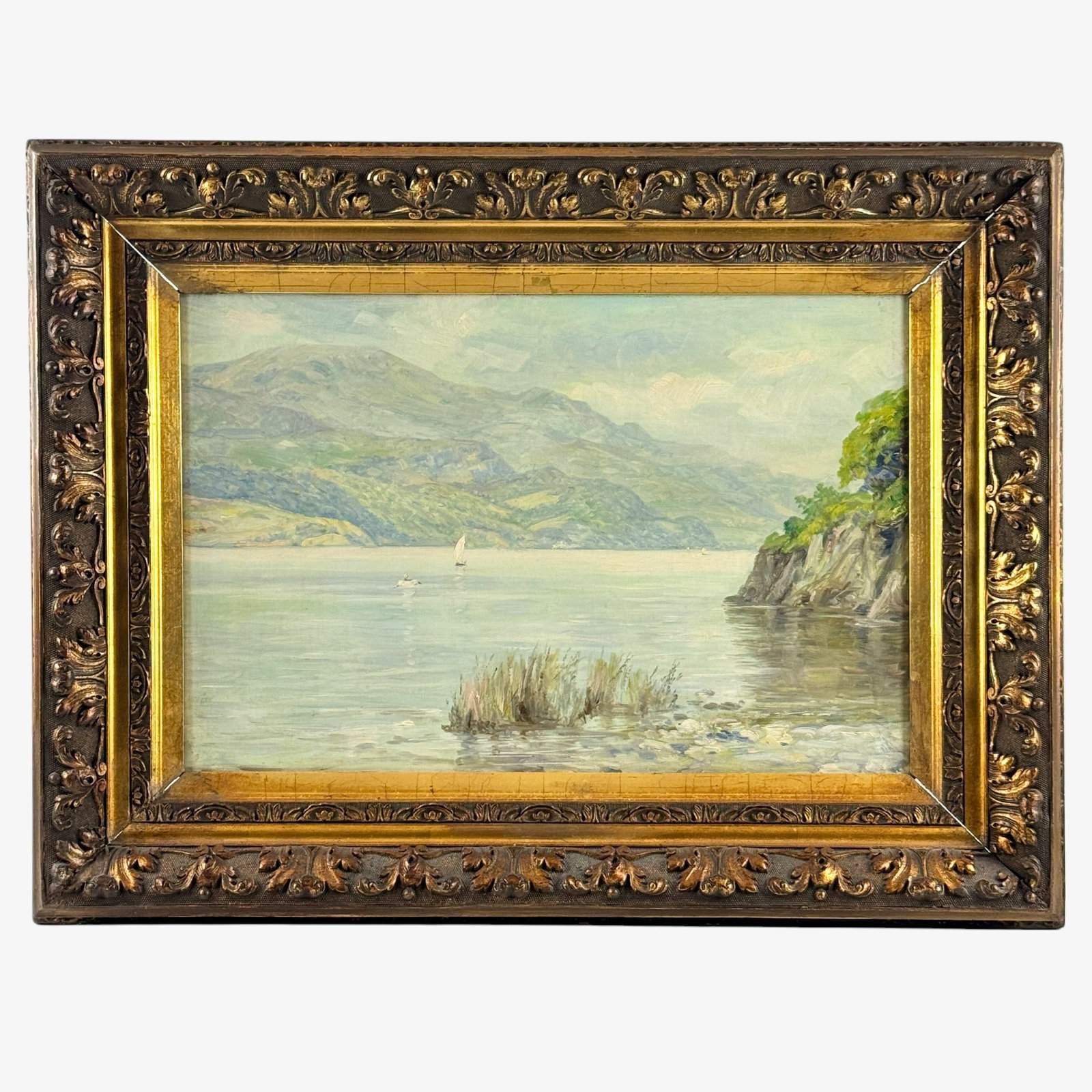 Robert Fowler (1853-1926) Landscape: "Boats on Lake Loch" by Robert Fowler, oil on canvas, housed in a gilt frame. Signature extremely faint to the left hand side. Accompanied by a piece of the paper backing with artist signature and tit