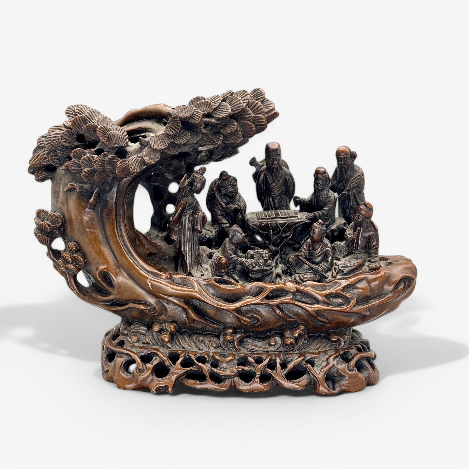 Asian Resin Scholar's Sculpture: A boat sculpture in resin, with scholars at a game under a tree. Ht. 6.25".