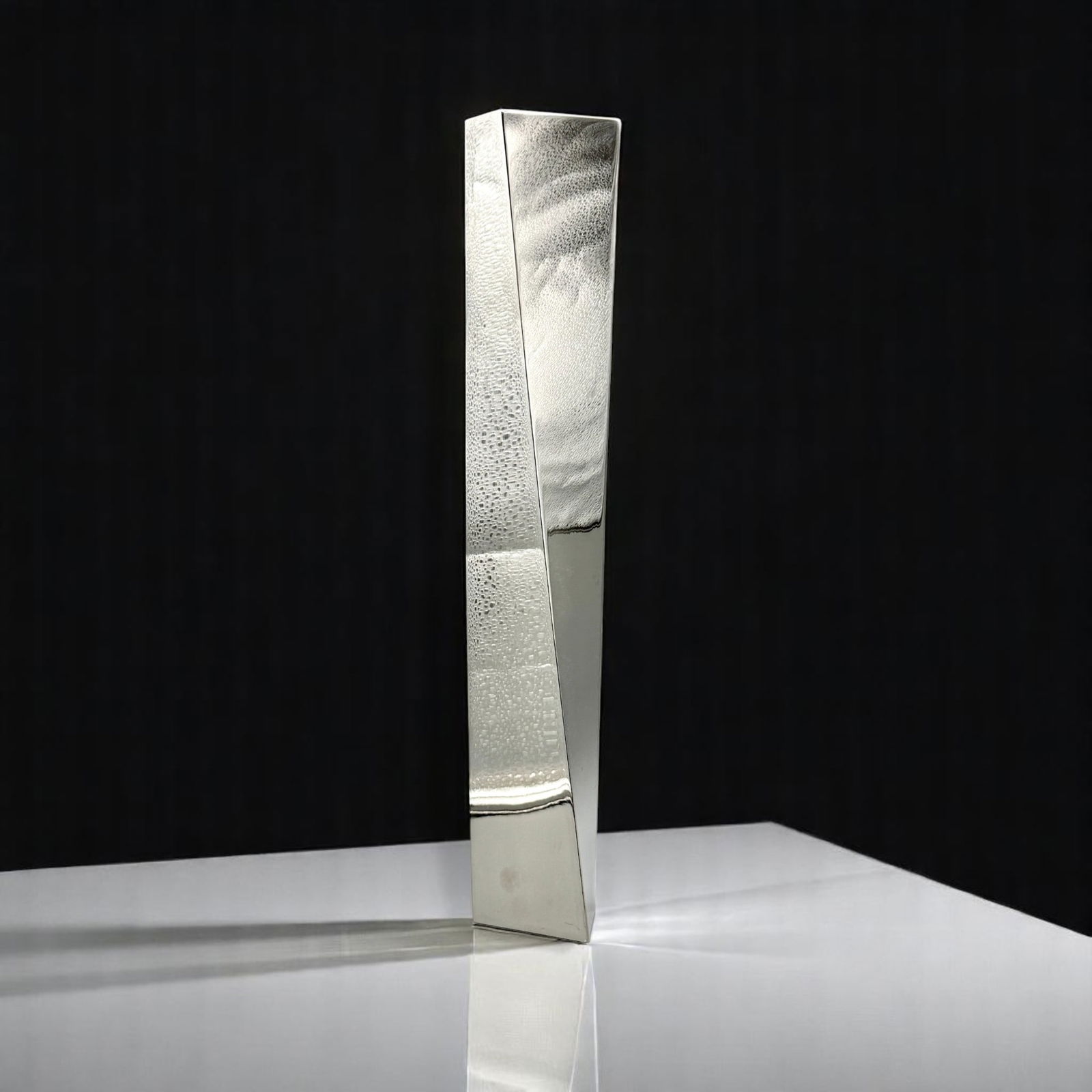 Zaha Hadid for Alessi, "Crevasse" Vase in Box: Stainless steel, designed by Zaha Hadid for Alessi, housed in original box. Ht. 17".