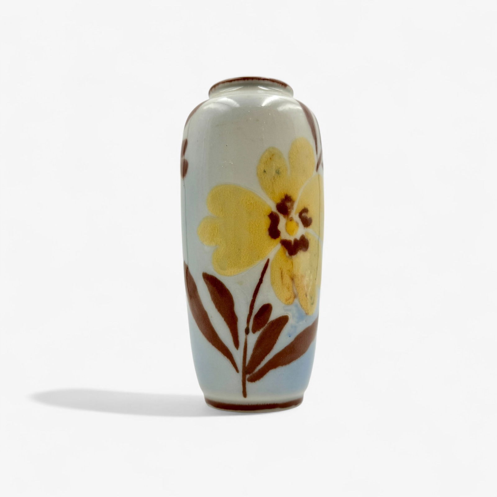 Rookwood Pottery: Elizabeth Barrett: Rookwood decorated porcelain with fern and flower by Elizabeth Barrett. 1945. Shape 6644E. Retains early Rookwood paper tags, price tag which are signed by the artist as well. 6 3/8" ht.