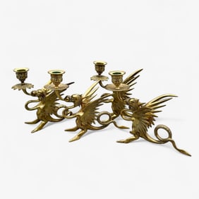 Group of Four Brass Dragon Candleholders