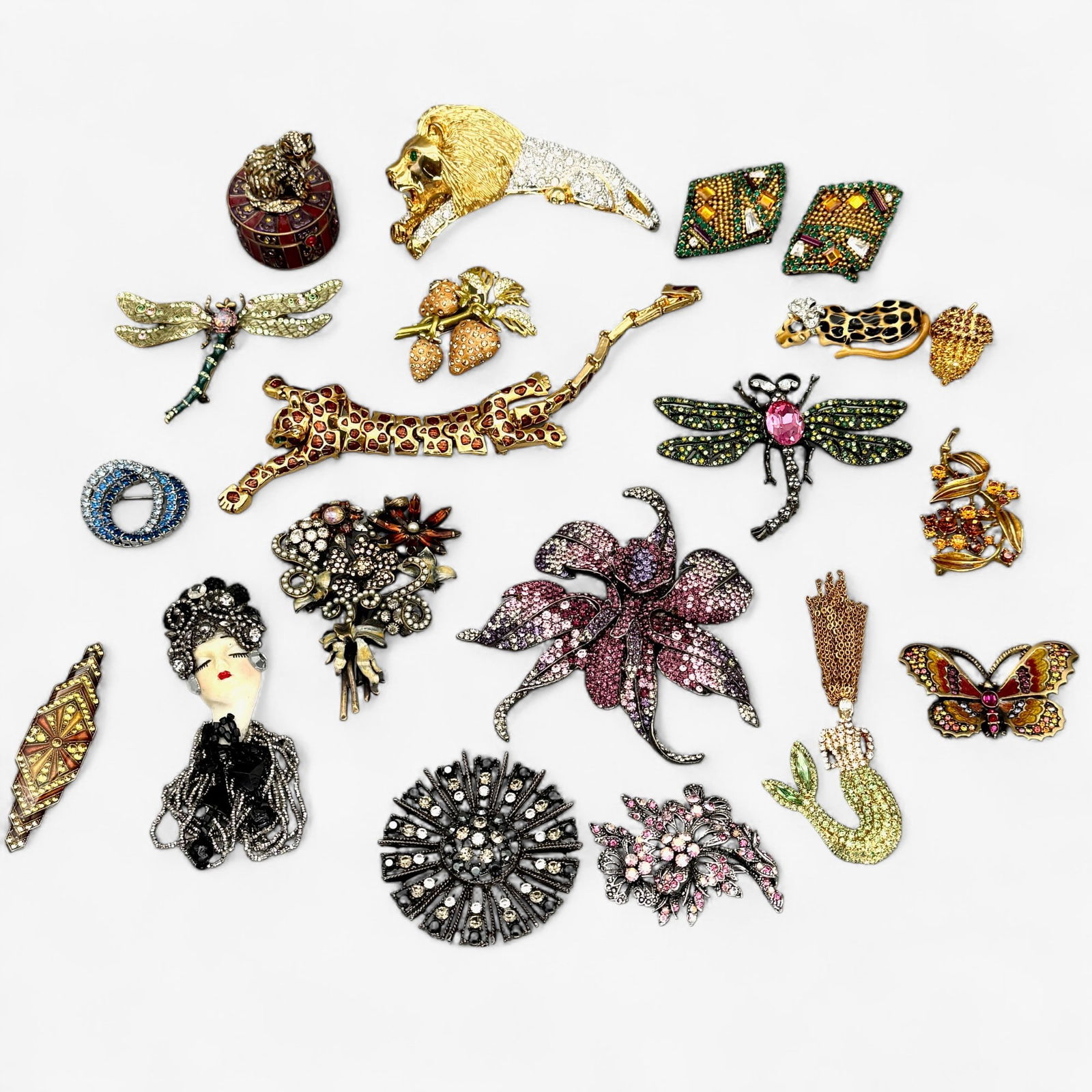 Jay Strongwater, Bauer, and Other Enamel Jewelry: Including a pill box by Strongwater, a butterfly pendant, and a dragonfly, as well as other makers in heavy enamel costume. 20 pieces in total.