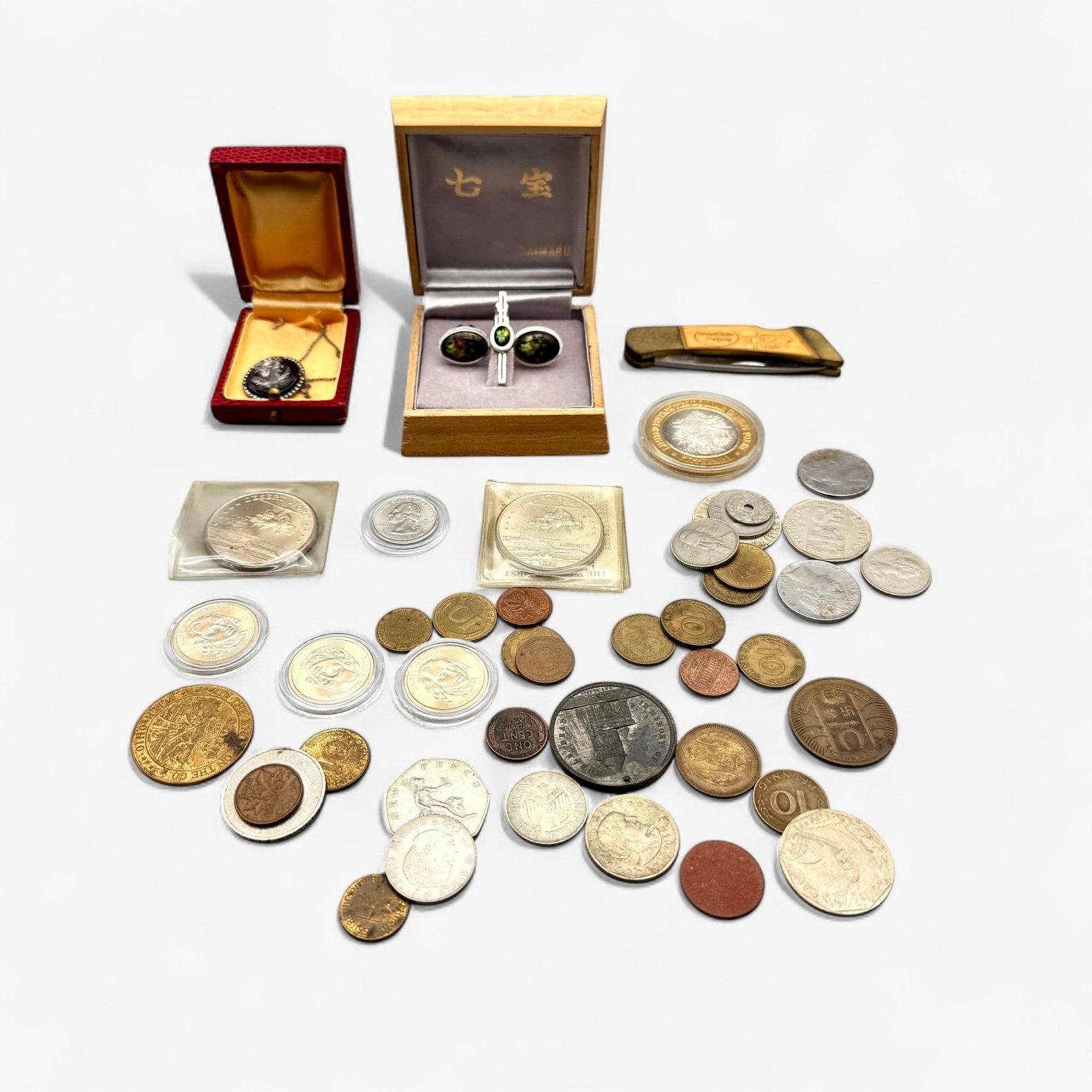 Group of Miscellaneous Coinage and Jewelry: Including one cameo necklace, miscellaneous coinage, a Daimaru earring set in box and a pocket knife.