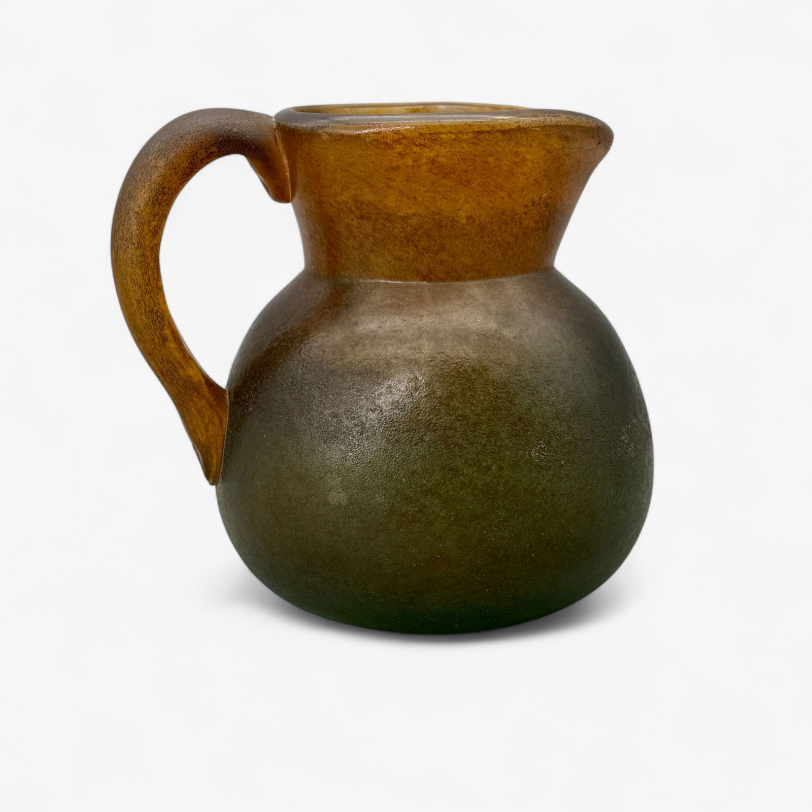 Georges de Feure Acid Cut Pitcher: French, early 20th century, in mottled green and orange coloration. Signed to base. Height: 7"