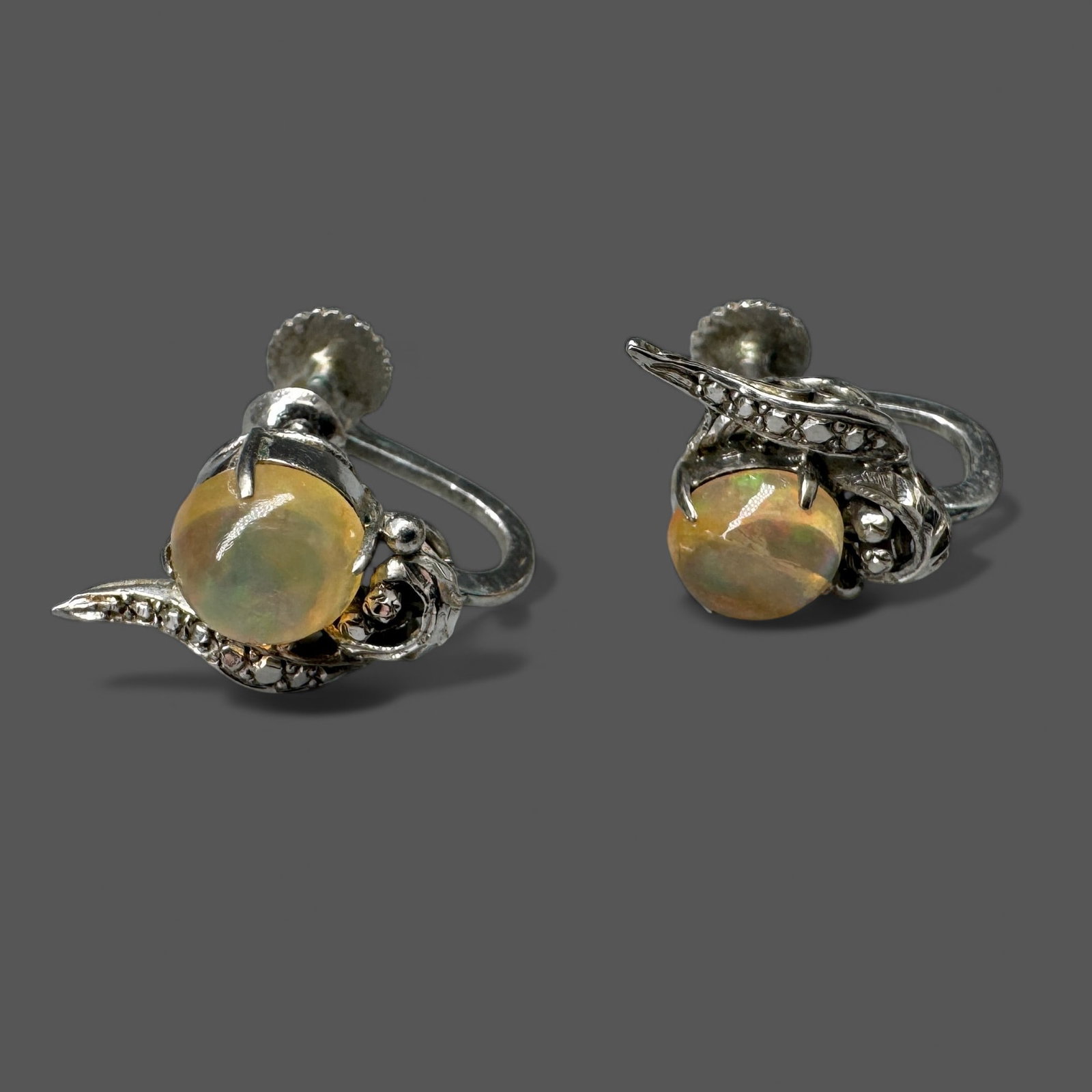 Pair of 14K Ladies Stud Earrings: Both with 14k gold marked to stud component. Total weight: 4.3 grams Property from the Estate of June Herschede (1930-2025), of the Herschede Je
