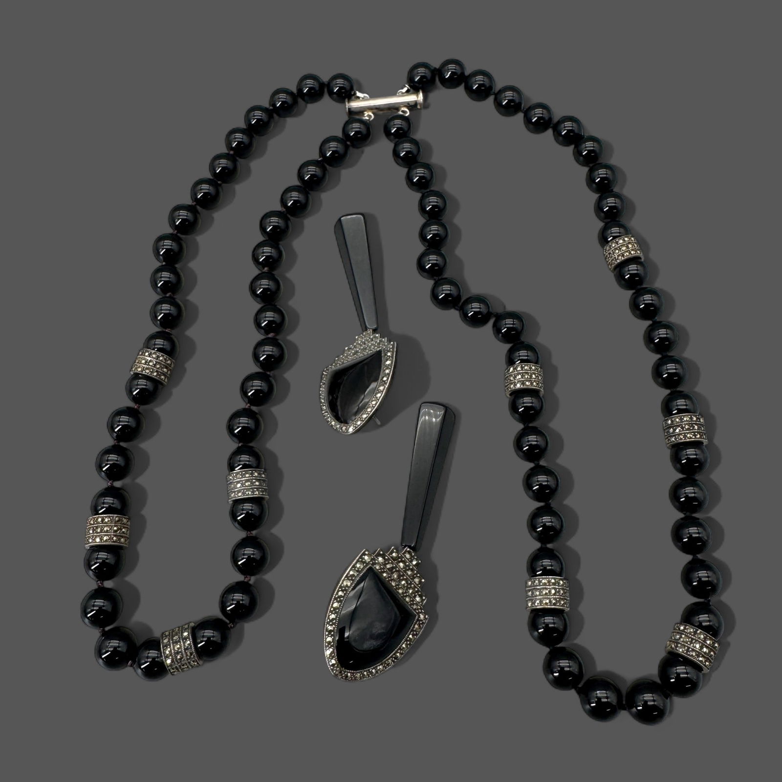 Sterling & Onyx Necklace and Earrings Suite: Onyx double chocker necklace, along with pair of sterling and onyx drop earrings.