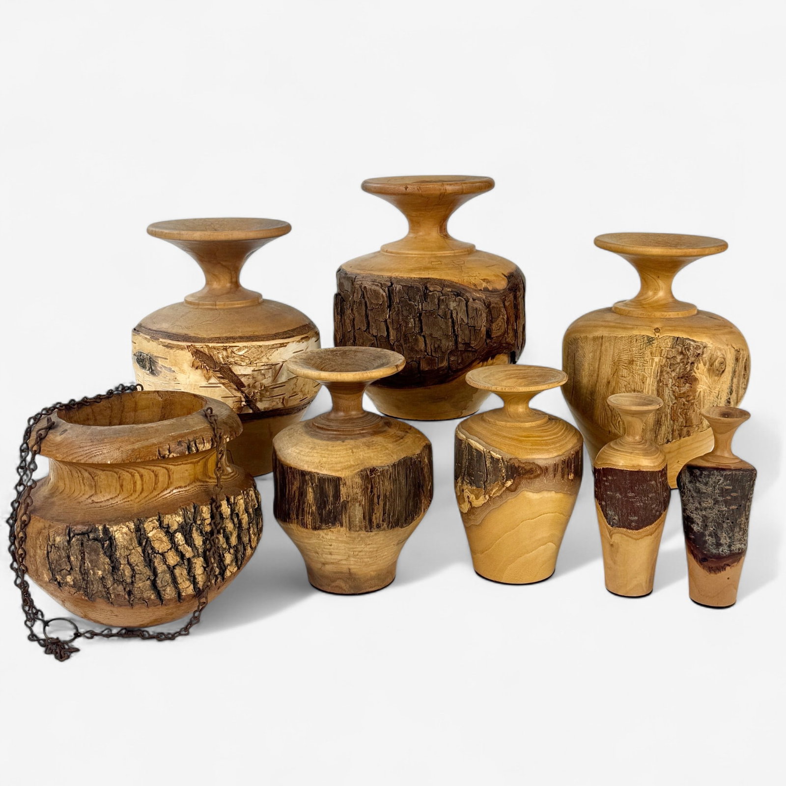Group of Robert Beaven Hand Turned Wooden Vases: 8 in total, many examples in white birch with applied birch to exterior. Tallest height: 6.5"
