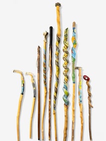 Group of Ten Carved and Painted Folky Canes and Staffs