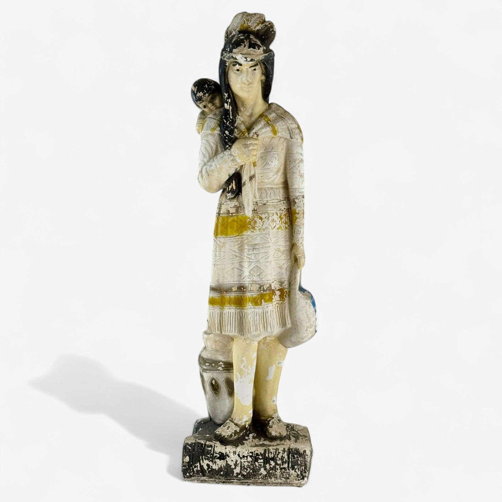 Plaster Sculpture of Indian Squaw with Child: Painted plaster full length American Indian woman, with child on her back and pottery at her feet. 39 1/2" ht.