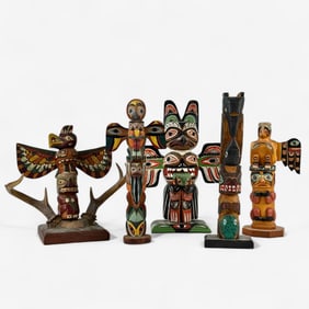 Five Northwest Coast Carved and Painted Totems