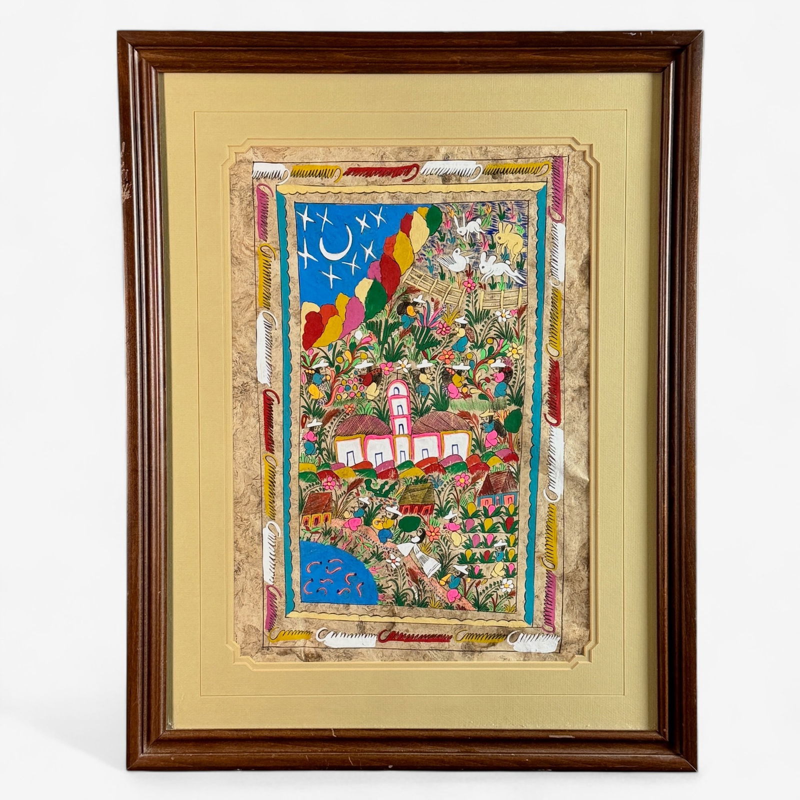 Pair of Carribean Themed Artworks: One by Guillermo J. Apeza depicting a lush street scene with figures and vegetation. The other an unsigned gouache / pastel farming scene. Both framed. Largest framed size: 28" ht. x 21.5" wd.