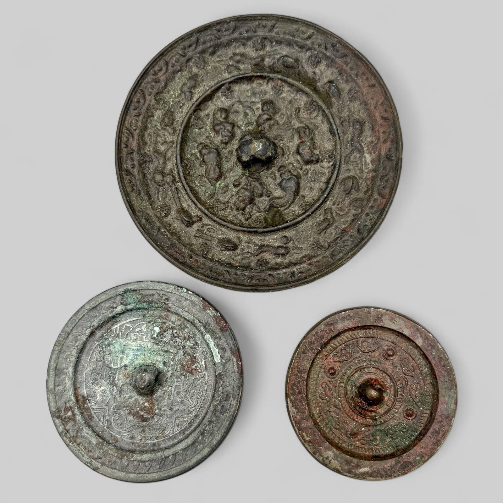Three Chinese Bronze Mirrors