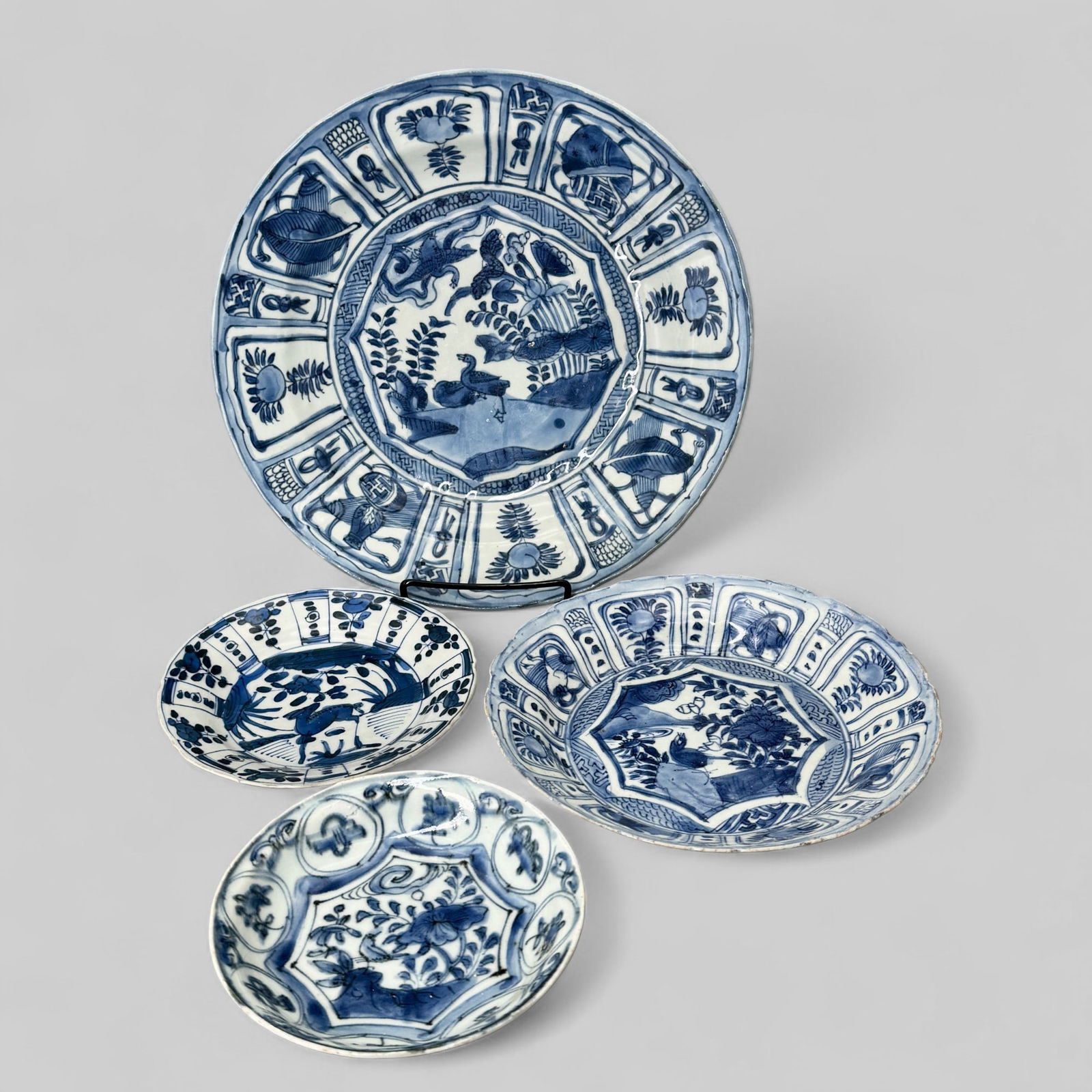 Blue and White "Kraak" Porcelain Dishes: Ming, a group of 4 porcelain dishes with "Kraak" designs, especially near the rims. Largest diameter 11".PROVENANCEPrivate Midwestern Collection, acquired from sources in Southeast Asia, ca. 1965-197