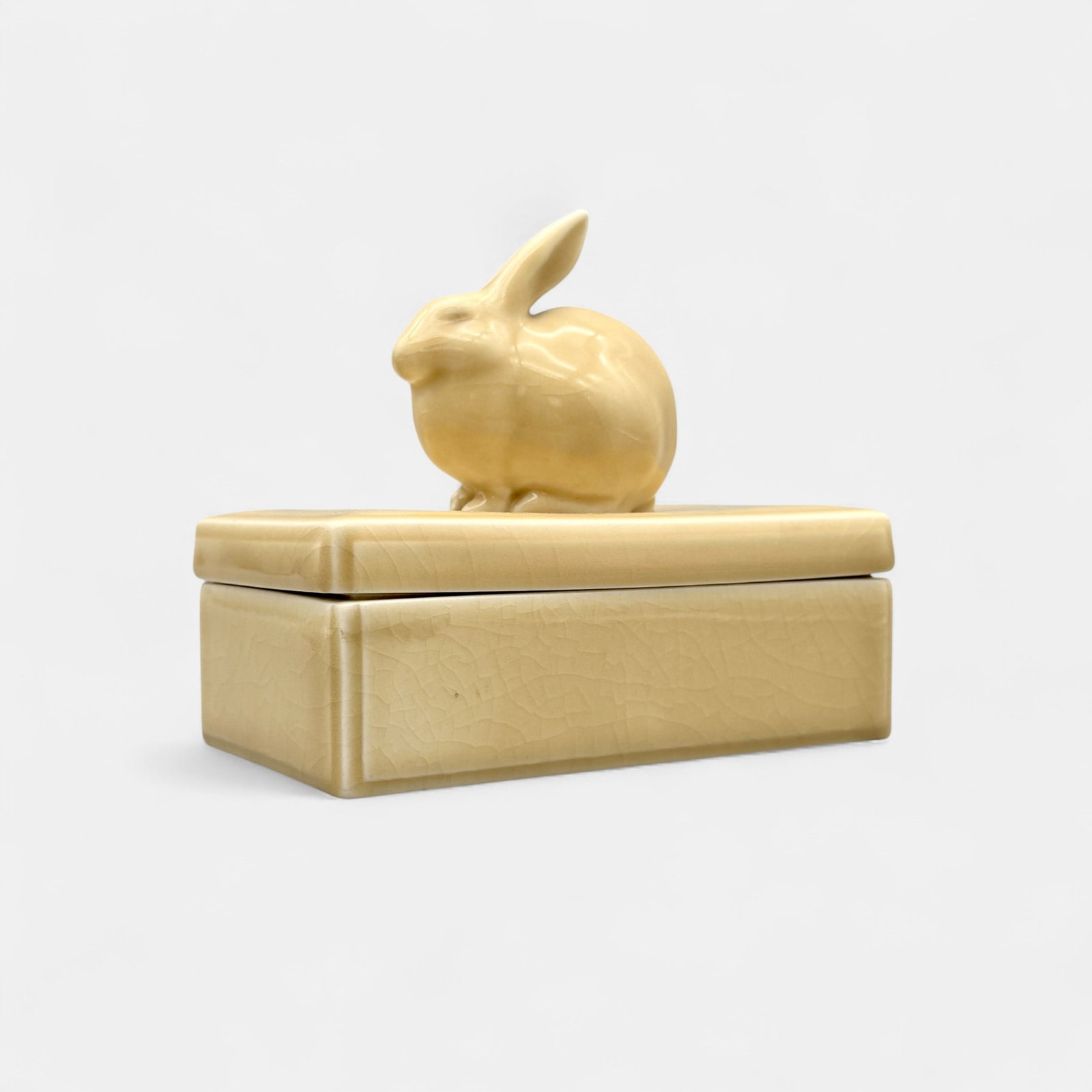 Unusual Rookwood box with 3-D rabbit on lid: Unusual Rookwood box with rabbit finial on the lid, shape 6850 from 1943. The rabbit itself is shape 6160, a Louise Abel design. 5 3/8 inches.