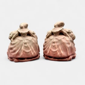 Pair of Rookwood "Colonial Woman" bookends in rose