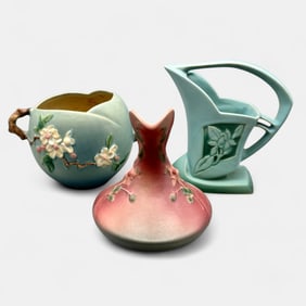Three Roseville items. Silhouette basket, Columbine pitcher and Apple Blossom bowl.