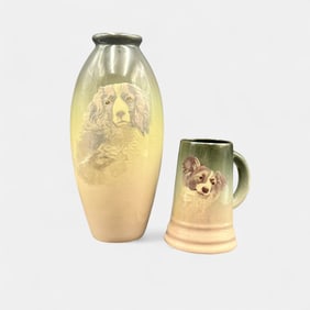 Two Weller Eocean items.  Tall vase and mug with dog portraits by Blake.