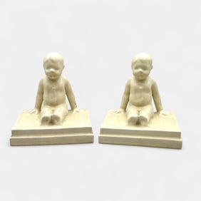 Set of Rookwood "Seated Boy" bookends, 1920.