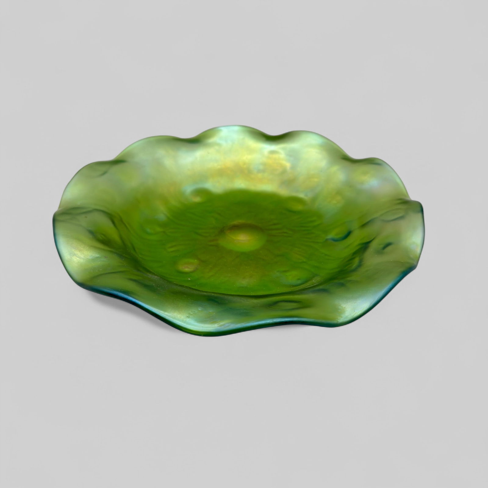 Loetz Art Glass Green Dish: Marked Loetz, Austria to underside, a green dish with lobed exterior. Diameter 9". Property of a Rockford, Illinois collector
