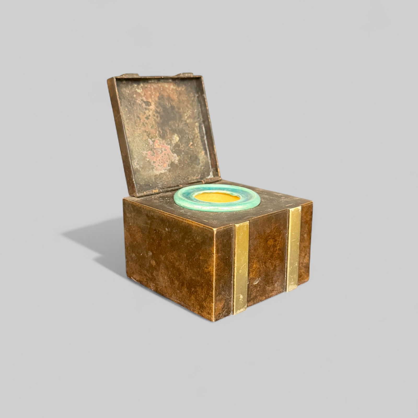 Arts and Crafts Bronze Inkwell with Pewabic Pottery Insert: Mixed metal with ceramic Pewabic Pottery insert. Insert has factory mark and shape number "80." 3" x 3" x 2.5" Property of a Rockford, Illinois collector