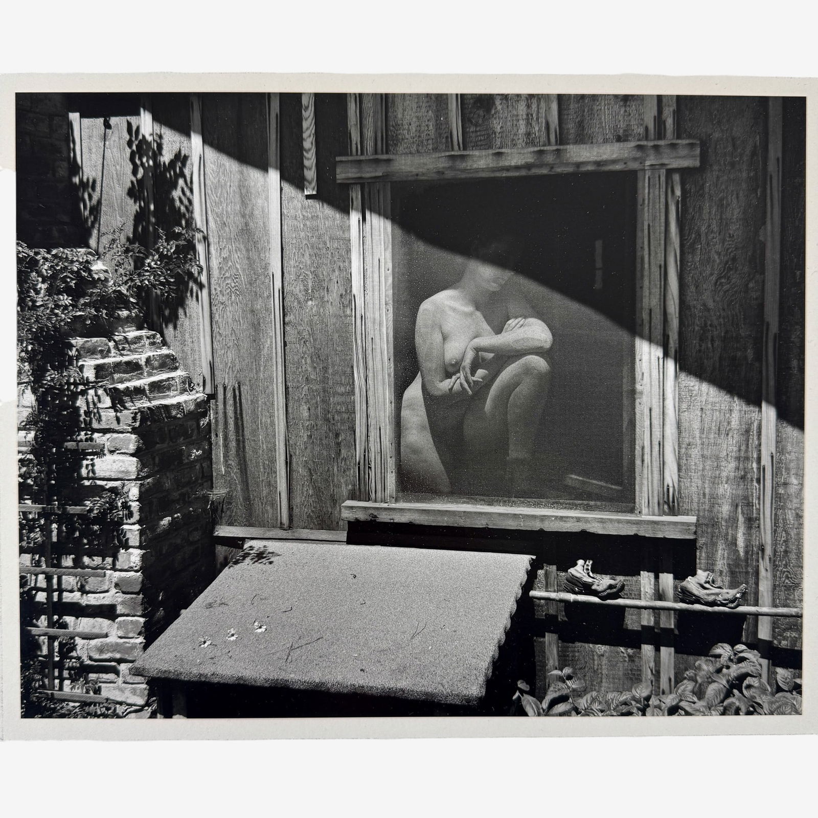 Edward Weston (1886-1958): Nude Behind Screen. Numbered to backside of upper right "N43-CH-1" and titled to upper right of back. Printed posthumously and stamped by Cole Weston, signed by Cole Weston to reverse in graphite. Ima