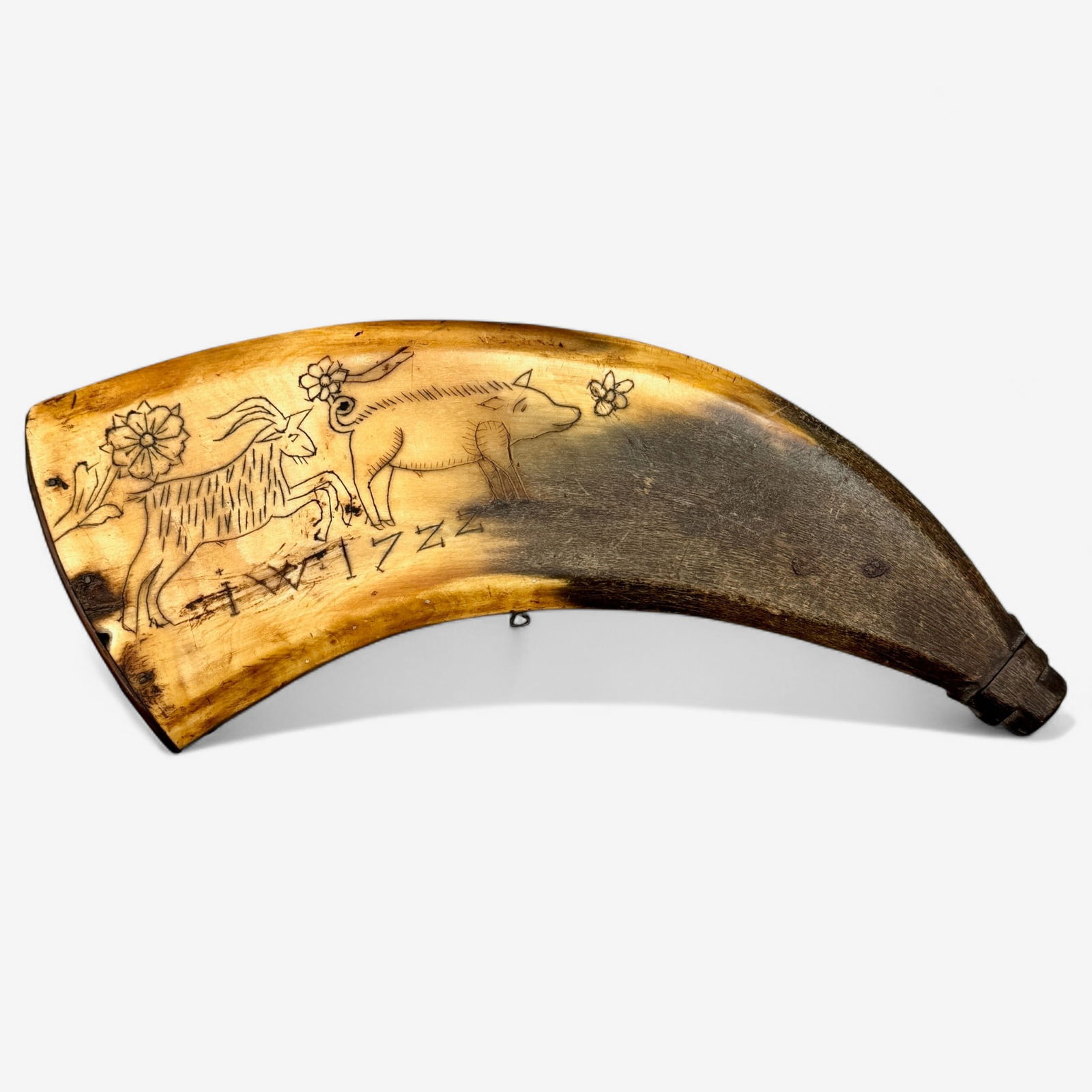 Early Scrimshawed Powderhorn: Powder horn etched with varying animal subjects to both sides and florals throughout. Atop custom stand.