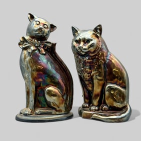 Pair of Iridescent Cast Iron Cat Dusters