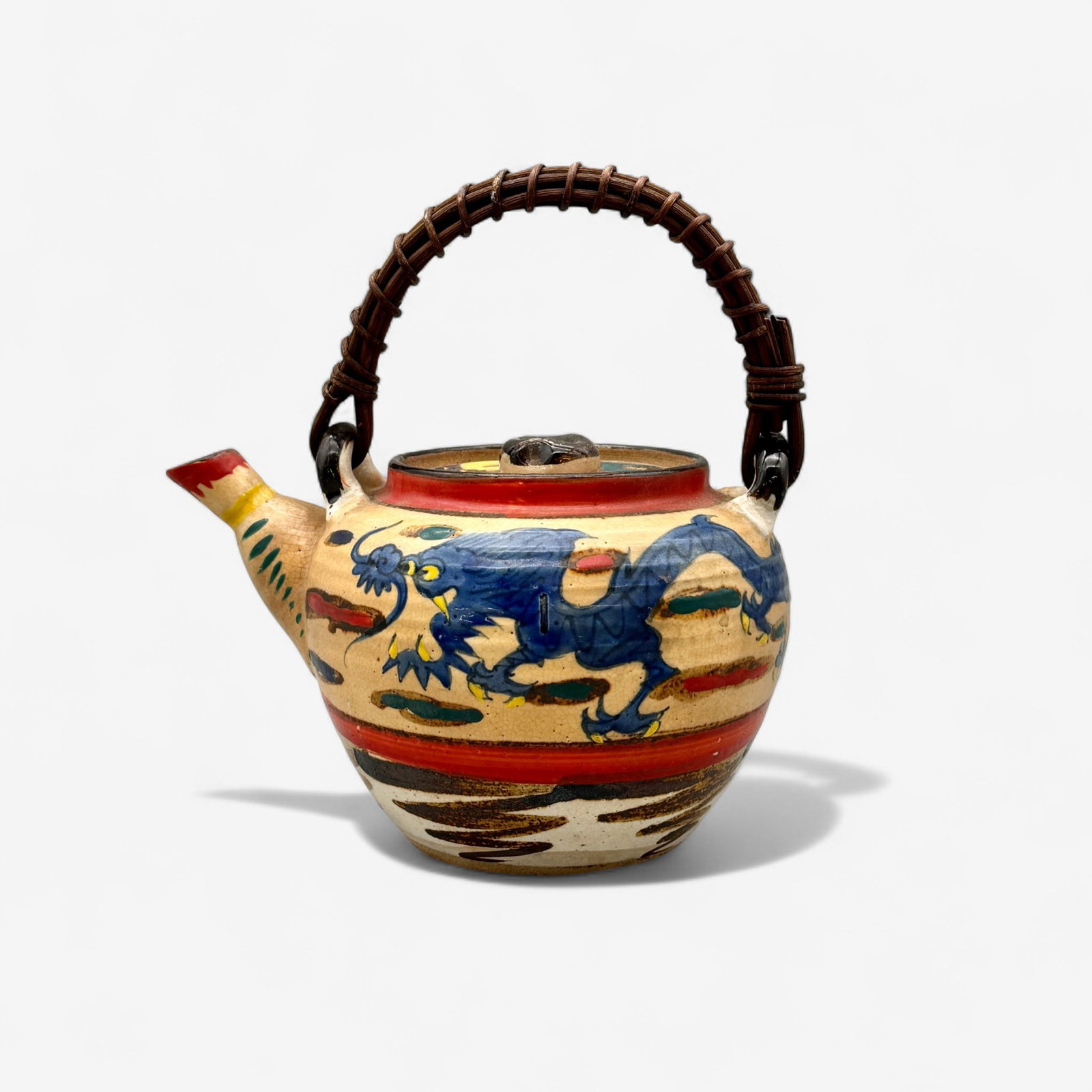 Japanese Teapot: Polychrome Glaze, reed handle, mid-20th century. Ht. 5".