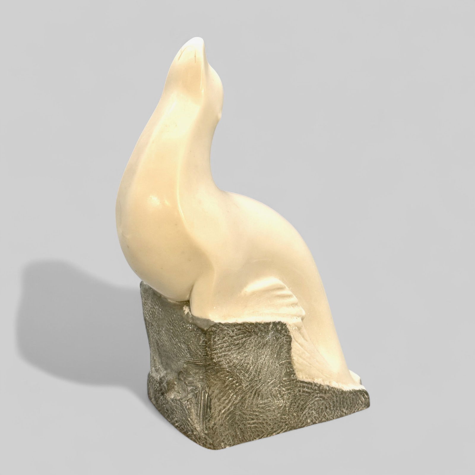 Vincent Glinsky Marble Sculpture of a Seal: Sitting atop a stone base, signed to the stone base. Height: 11", width: 7"