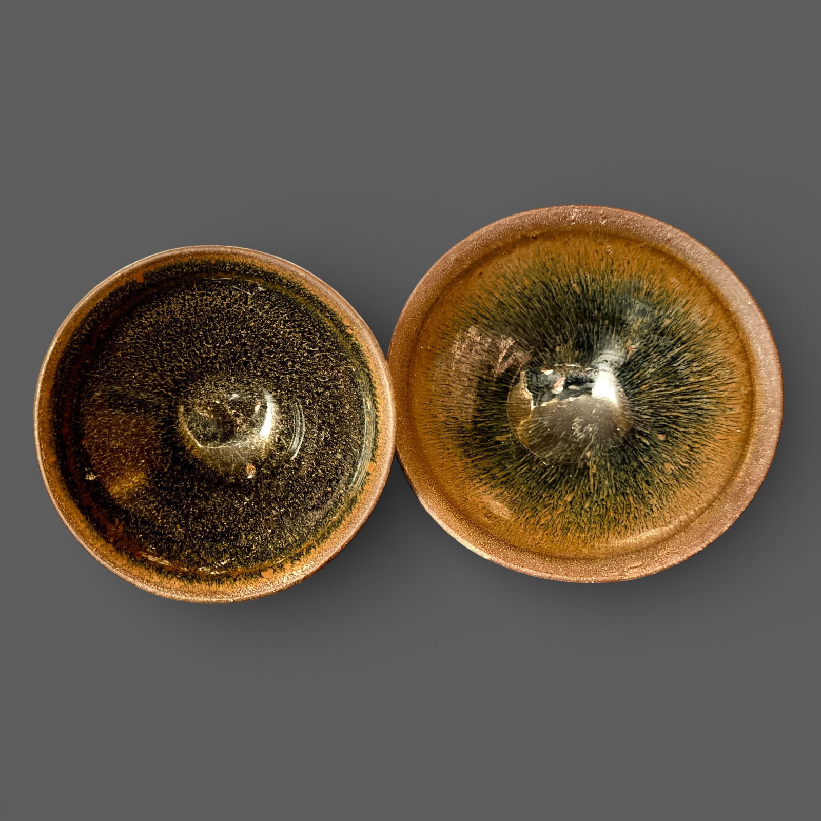A Pair of Jian "Hares Fur" Bowls: Southern Song dynasty. Two "Hares fur" tea owls, both with russet coloration. One slightly larger than the other. Diameter of each: 4" and 4.75" PROVENANCE Private Colle