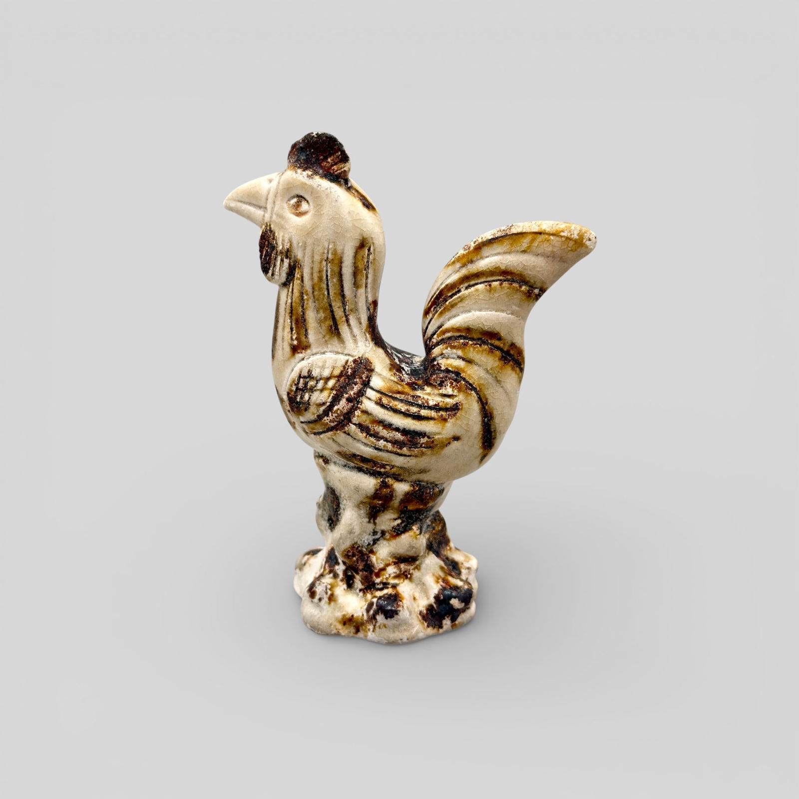 Spotted Qingbai Ware Rooster: Yuan dynasty. Spotted ware rooster figure. Ht. 4.75". PROVENANCE Private Collection, Columbus OHCollected from sources in Southeast and East Asia, ca. 1965-1975, a