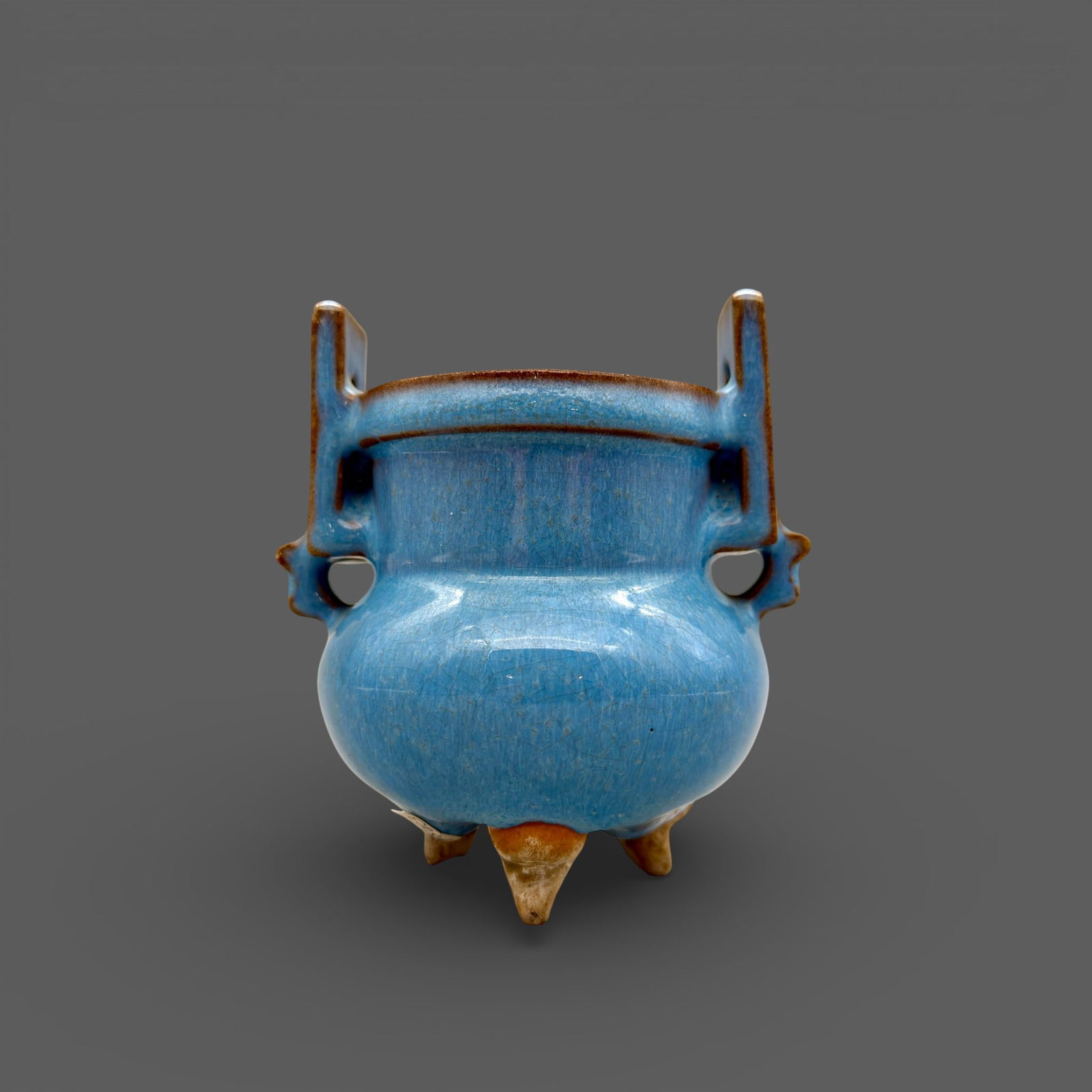 Song/Yuan Sky Blue Jun Ware Censer: Song/Yuan dynasty. A sky blue glazed tripod censer. Ht. 4.5". PROVENANCE Private Collection, Columbus OHCollected from sources in Southeast and East Asia, ca. 1965