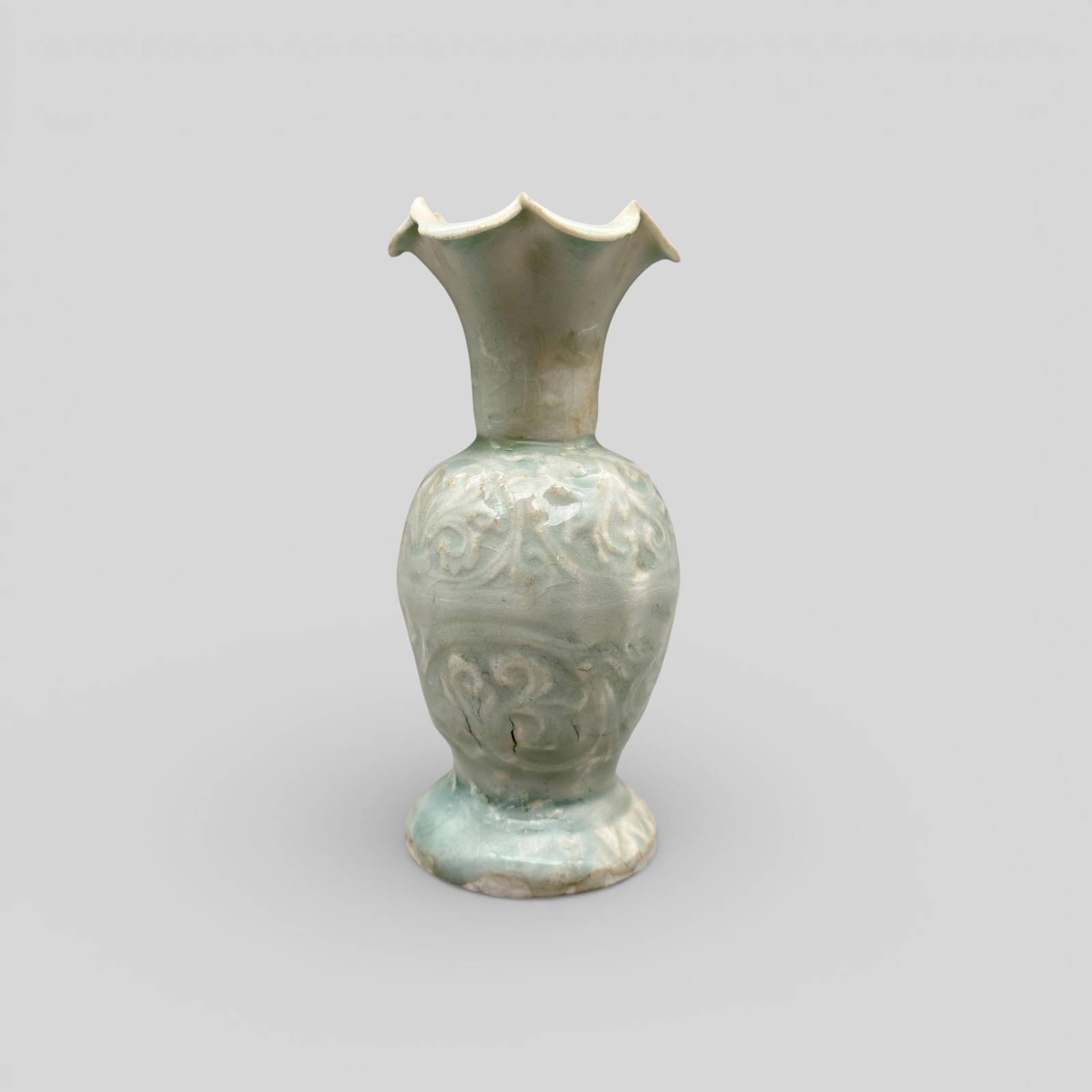 A Carved Qingbai-Glazed Floral Lobed Vase