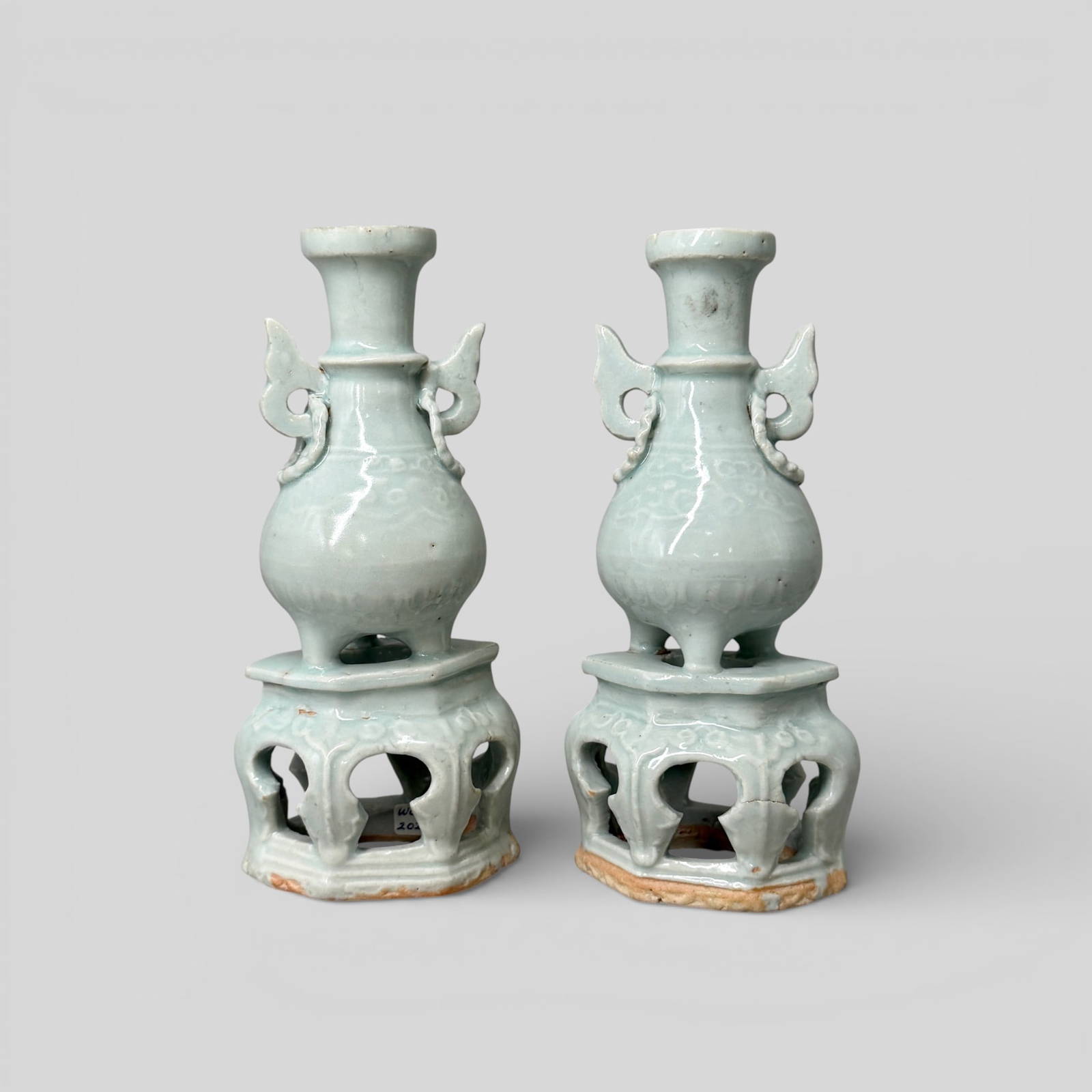 A Pair of Qingbai Pedestaled Two-Handled Vases