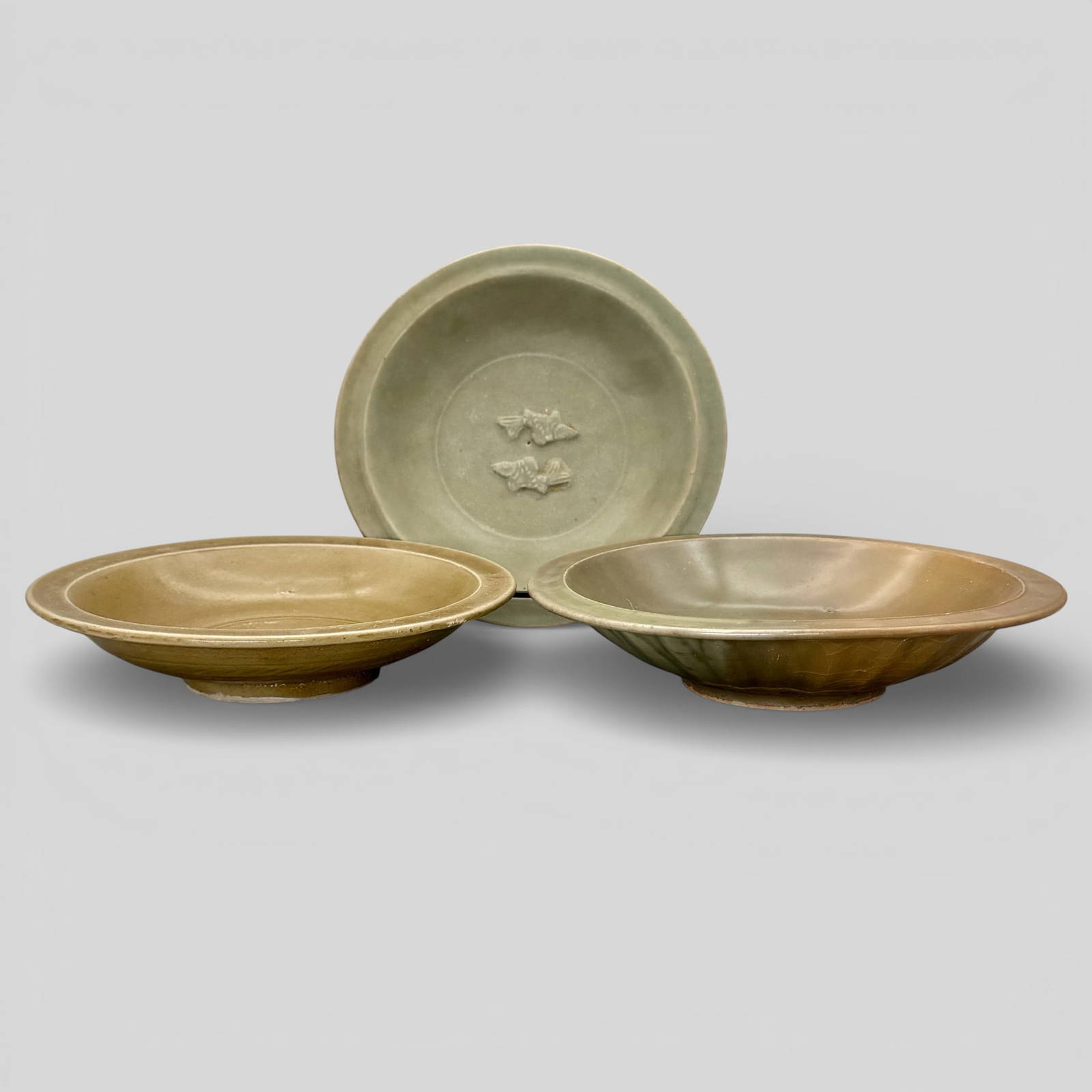 Three Longquan Celadon \"Two Fish\" Bowls