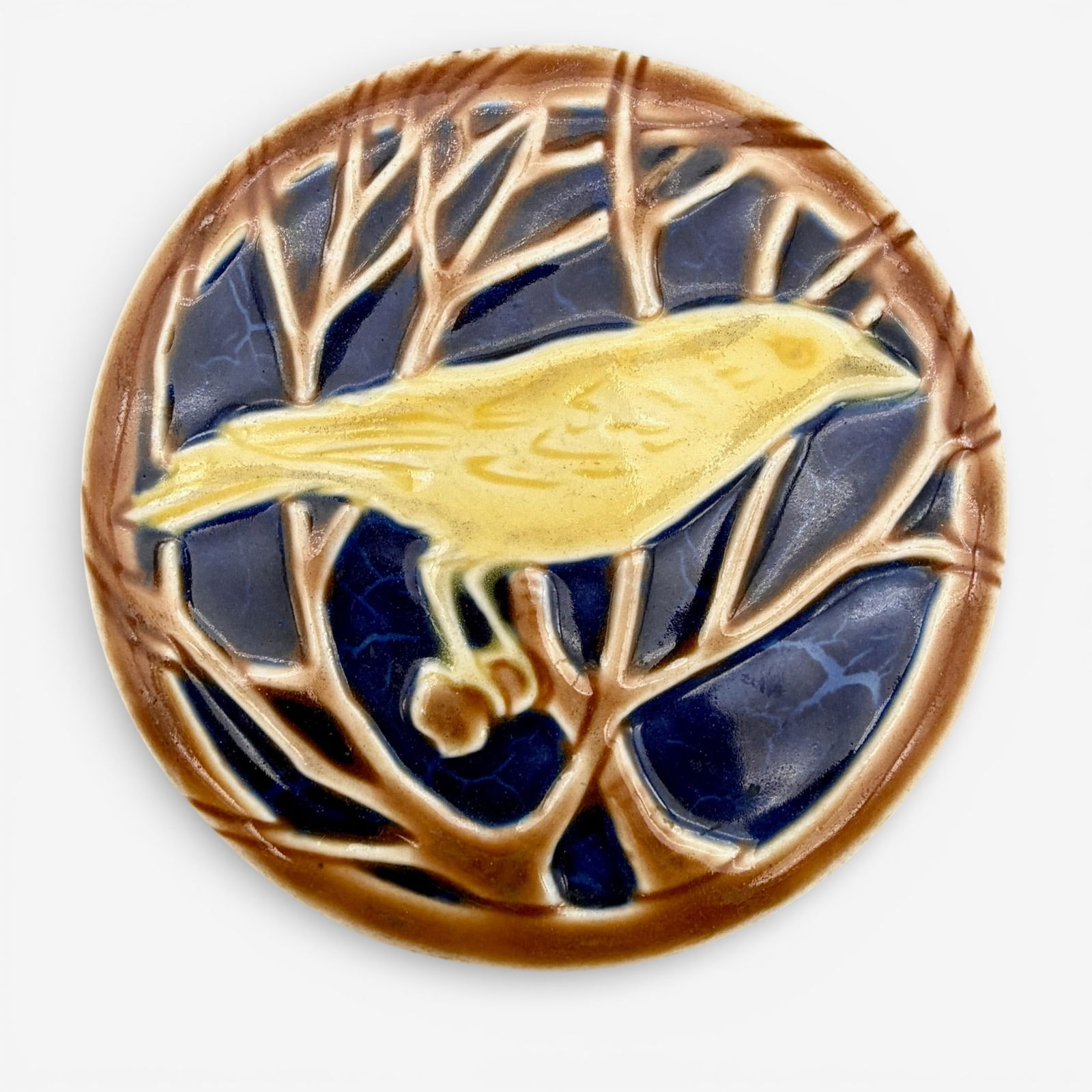 Rookwood high glaze circular "Yellow Bird" trivet: Rookwood polychromed circular trivet, Yellow bird, shape number 2349, dated 1922.
