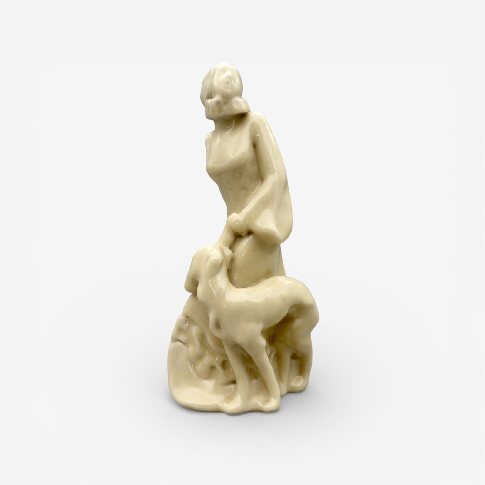 Rookwood woman and dog figural, 1918: Uncommon Rookwood porcelain figure, an elegant woman with Russian wolfhound, an Ernest Bruce Haswell design made in 1918. Impressed Rookwood logo, XVIII, shape number 2090 and sideways P for Porcelain