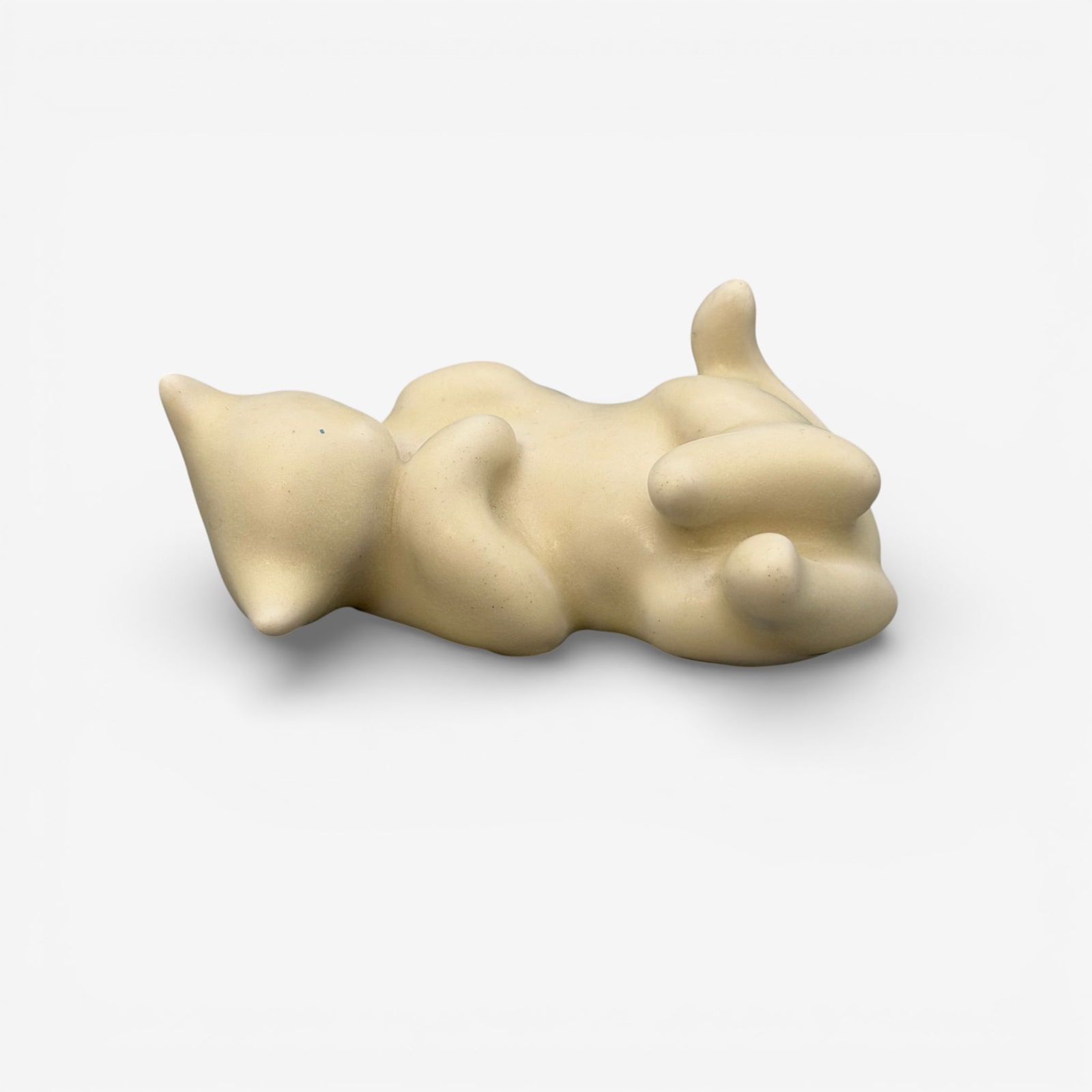 Rookwood "Laying Down Kitten" white mat glaze: Uncommon Rookwood "Laying Down Kitten" in white mat glaze, shape number 6661, dated 1945.