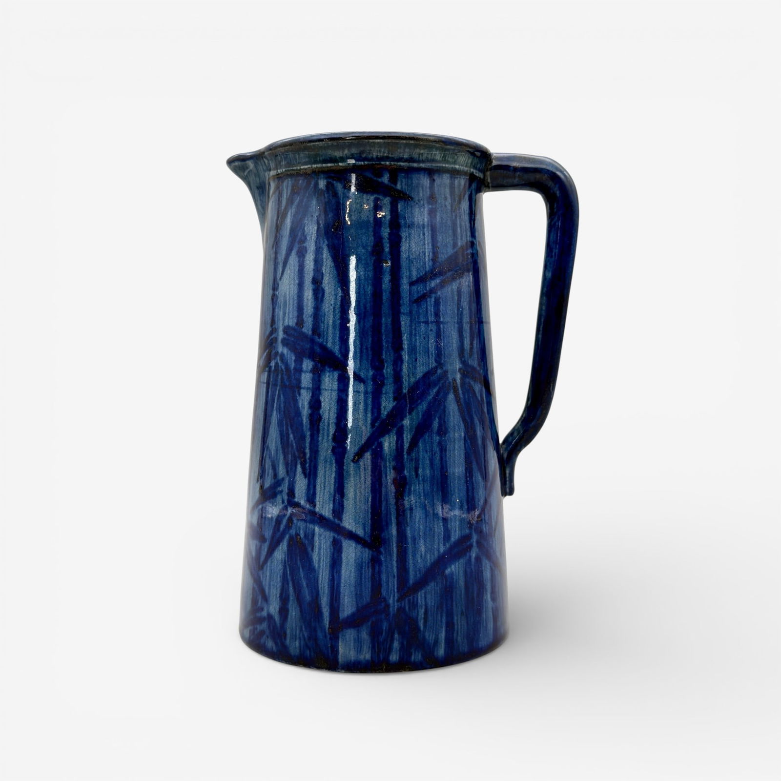 Newcomb early pitcher, Bamboo, Harriet Jour: Newcomb College high glaze pitcher with bamboo decoration done by Harriet Jour in 1902. Impressed NC logo, JH for potter Jonathan Hunt and U. painted JH for artist, date code Q4, triangle. Height 7 3/