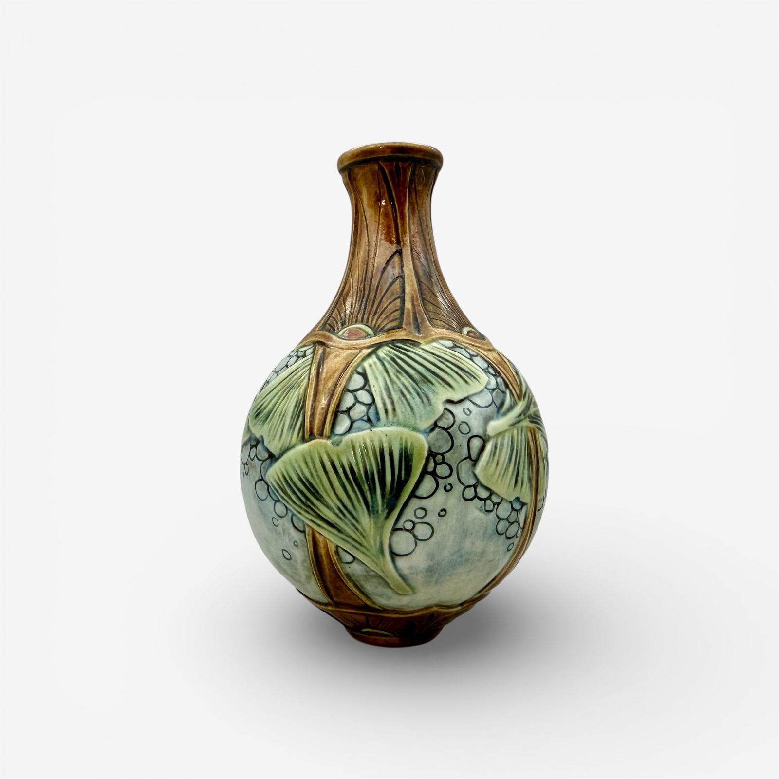 Stephanie Young porcelain vase, gingko leaves: Stephanie Young, Calm Water Designs, porcelain vase with carved gingko leaves in four panels. Incised SY 2014 on underside.